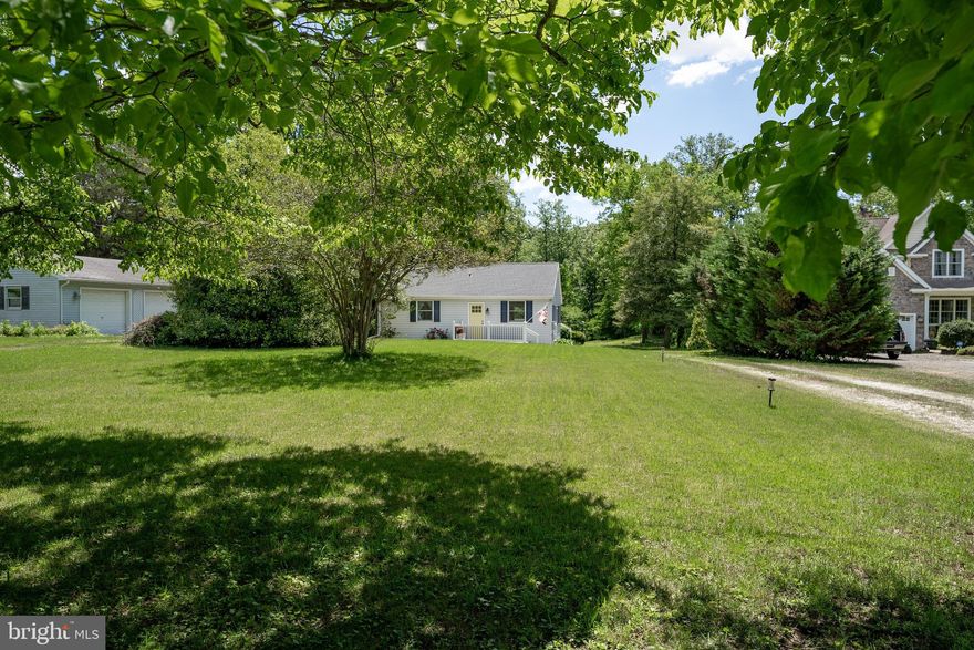 Cute cottage located on the upper Chester River!  Entertain on the spacious rear deck.  Watch the Chester River slowly meander to more wide open waters.  Follow the gently sloped backyard to the updated bulkhead at the water's edge.  Launch your kayak and explore the river and allow the tide to take you as you explore the river.  When done relax indoors to an updated home that offers an open floor plan as the living room and kitchen merge as one.  This home was updated several years ago so there is very little you would need to do other than adding your own personal touches.  There are 2 bedrooms with wood floors and a single bath.  The living room and one of the bedrooms offers access to the rear deck through sliding glass doors.  There is a full basement with connecting stairs from the main level.  Here is where you will find the laundry.  There is plenty of storage space and could possibly be finished living space if the new owner would like to tackle the project.  You will be hard pressed to find anything on the water this cute and in this price range so come take a look and decide for yourself!