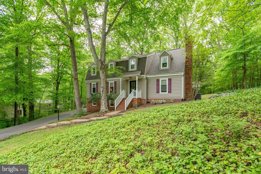 This one-of-a-kind Dutch Colonial has been lovingly updated and the location can’t be beat - close to downtown, the Rappahannock River, and Fredericksburg Nationals games.  Over 3,200 square feet of finished living space, it features 4 generous sized bedrooms, 2 full baths, and 2 half baths (and 2 fireplaces!).  Nestled on a quiet cul-de-sac, it features a lush backyard complete with a custom-built treehouse—perfect for outdoor play.  The newly stained and renovated deck provides peaceful relaxation.

Inside, you’ll find beautiful hardwood floors, designer paint colors, and stylish fixtures and finishes.  The home boasts two new Trane HVAC systems for efficient dual-zone heating and cooling.  

The kitchen is a standout, recently updated with a sleek stainless Euro-style range, stainless refrigerator, stainless hood vent, Bosch dishwasher, and a stunning copper sink. White cabinets, granite countertops and a travertine backsplash tie it all together. Don’t miss the huge walk-in pantry, which includes built-in cabinetry, countertop space, floor to ceiling shelves, and hidden outlets—ideal for storing and using small appliances. A convenient laundry chute has access points both upstairs and in the pantry. The sunny breakfast nook offers lovely views of the park-like backyard through a large bay window.

The layout blends traditional charm with an open concept feel—you can prep in the kitchen while still being a part of what's happening in the cozy family room, which features a gas fireplace and French doors (leading to the recently refinished deck). A formal dining room and living room, both freshly painted, complete the main level.

Upstairs, the spacious primary suite includes a gas fireplace and a beautifully renovated en-suite bathroom with a walk-in shower and new tile floors and walls. 

Two bedrooms include charming window seats with built-in storage. The fourth bedroom features custom wall to ceiling built-ins, and the hall bath includes a deep tub, dual sinks, a large linen closet, and tile flooring. 

Cedar-lined closets are found throughout the home, and all bathrooms on the upper levels are finished with granite countertops.  Tasteful woven window shades were just installed last year professionally. 

Entry from the garage brings you into a practical mudroom, featuring an extra full-size refrigerator and a perfect drop zone. Downstairs, the basement offers a laundry room with new oversized top-load washer and dryer, a half bath, and a generous flex space that can serve as a rec room, office, or guest area.  Windows are newer and double paned, making cleaning them a breeze.

Additional upgrades include a new front door and storm doors, a stamped concrete walkway in the backyard, recently added attic insulation for energy efficiency, and smart Nest thermostats.  The side yard has a tiered garden that blooms seasonally! Districted to highly-rated Riverbend High School.  Schedule your tour today! Pre-listing home inspection has already been done and can be shared with buyers.