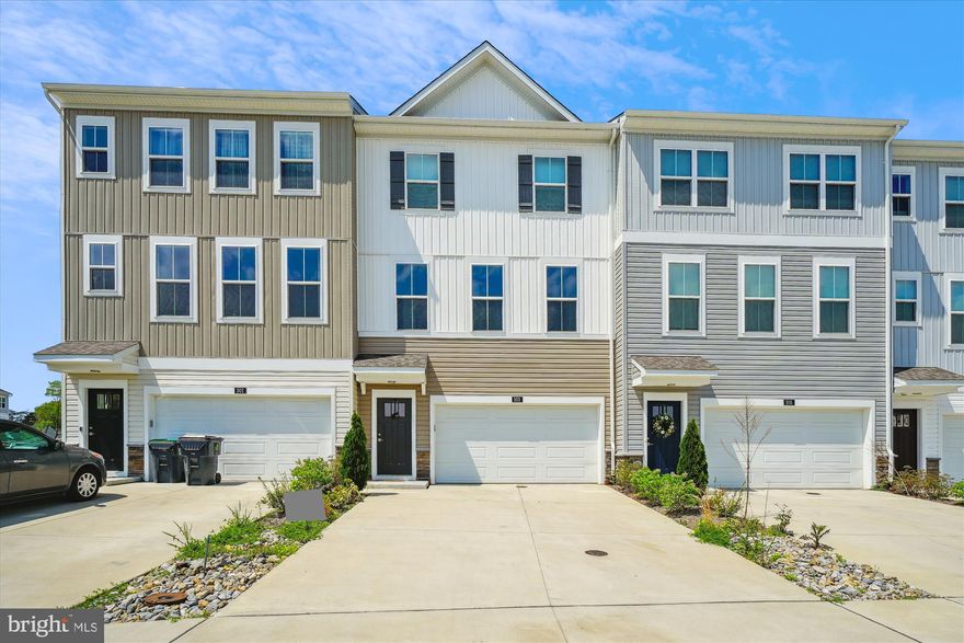 Welcome to this stunning, newly built townhome in the sought-after Cherryview Landing community! The main level features an open-concept layout with luxury vinyl plank (LVP) flooring throughout, creating a seamless flow between living spaces. Enjoy cooking and entertaining in the gourmet kitchen, complete with stainless steel appliances, a spacious island with countertop seating, and elegant pendant lighting. A separate dining area provides the perfect setting for gatherings, and a convenient powder room is also located on the main level. Upstairs, the spacious primary suite includes a private ensuite bathroom with a dual vanity and a generous walk-in closet. Two additional bedrooms, each with access to a shared full bath, offer comfort and flexibility. The fully finished lower level includes an additional bedroom and full bathroom.  Additional highlights include a two-car garage, driveway parking, and a prime location just seconds from I-95 and Route 17—perfect for commuters. You're also just a quick drive to charming downtown Fredericksburg with its shops, dining, and historic sites!