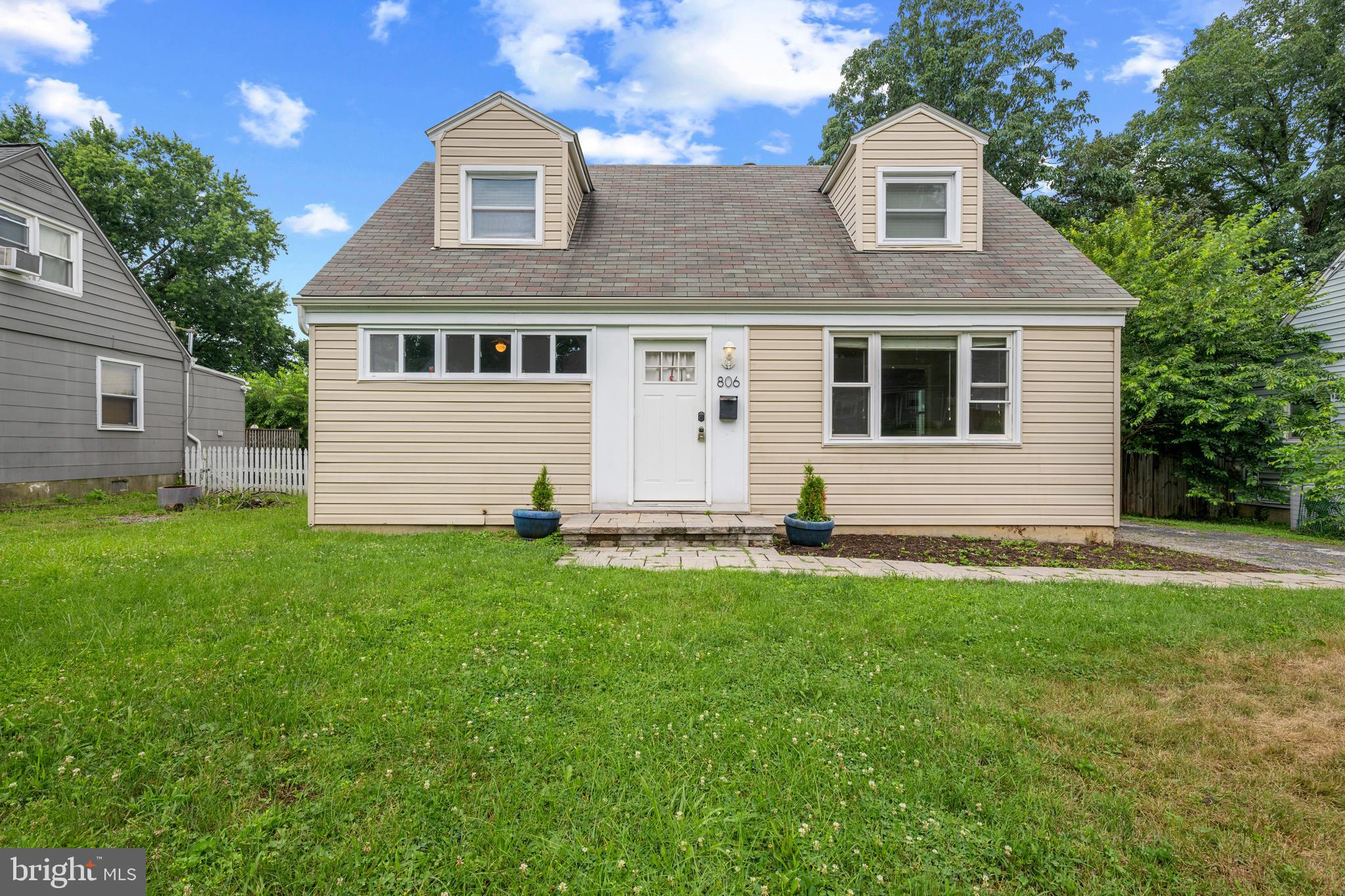 $20,000 Price Adjustment! Welcome home to this beautifully updated Cape Cod, ideally located in the vibrant heart of Pikesville—just minutes from shopping, dining, parks, and all major commuter routes. Blending timeless 1950s character with stylish contemporary upgrades, this move-in ready gem offers comfort, charm, and functionality in equal measure. Enjoy the convenience of a detached 1 car garage! Step inside to discover a sun-drenched living room where natural light pours through a front wall of windows, highlighting the original parquet floors and seamless flow into the dining area and kitchen—perfect for both everyday living and entertaining. The renovated kitchen is a showstopper, featuring crisp white shaker cabinetry, sleek butcher block countertops, stainless steel appliances, and an eye-catching industrial-style sink and faucet. Ample cabinetry and extended counter space make it a dream for home chefs and weekend bakers alike. Just off the kitchen, a thoughtfully designed laundry room provides added storage, and direct access to the patio and expansive, fully fenced backyard—ideal for summer barbecues, playtime, or simply unwinding under the stars. Two generously sized main-level bedrooms and a beautifully updated full bath offer convenient one-level living. Upstairs, you'll find two additional spacious bedrooms, each with cozy charm. Meticulously maintained by the original owner and thoughtfully renovated, this home combines classic appeal with modern comfort in a location that truly has it all. Don’t miss your chance to own this one-of-a-kind Pikesville treasure! Recent updates include: water heater (2025), refrigerator (2024), washing machine (2022), HVAC (2023), carpet (2025), fresh paint (2023).