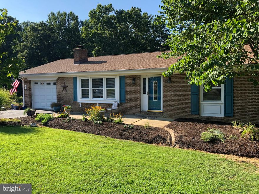 BONUS !! 3000.00 to selling agent for contract written on or before 8/31/19 to be paid at closing. Great Locale,five minutes from Laplata schools and shopping.Come tour this all brick , freshly painted home inside and out. I car attached garage with a large expanded driveway for 3-4 additional vehicles. This welcoming 4 bedroom 3  bath rambler include newly renovated kitchen/dining area with beautiful granite countertops, designed especially for family , friendsweekend and holiday gatherings.New dork hardwood flooring on the main floor. Fully finished basement with cozy fireplace and a wood storing built in brick area, all centered around the family room for entertaining. Walk out of the basement sliding door to the large rear pation overlooking the large back yard groomed to perfection. Enjoy the huge 6-7 car detached garage which already has a rough in plumbing done for future use . Maybe a man-cave or maybe an apartment . The imagination can go in many directions with this gem. Owners have price this house to sell so hurry , 'cause it wont last long