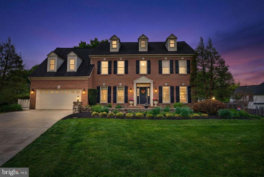 Elegant 5BR/5.5BA brick front residence tucked away on a desirable court in the heart of Lutherville. Distinctive in both scale and design, this home offers expansive living space across three above grade levels and a beautifully finished lower level, yet still feels warm, inviting, and thoughtfully designed. Situated on a premium lot at the base of the court with expansive green space, the property features extensive hardscaping, a sports court, deck, and a truly unique screened gazebo overlooking the landscaped backyard, creating an ideal setting for relaxing or entertaining. An attached two car garage, functional mudroom area, and dedicated laundry room off the kitchen provide everyday convenience.

A dramatic three story foyer creates a stunning first impression and opens to the soaring family room, where floor-to-ceiling windows fill the space with abundant natural light and overlook the backyard. The gourmet white kitchen is beautifully appointed with an island, wine fridge, abundant cabinetry, and a spacious eat-in area ideal for casual dining and entertaining. The space also offers direct access to the deck and outdoor gathering areas. Elegant formal living and dining rooms and a beautiful private office with built ins and expansive windows are complemented by extensive wood moldings, picture-frame detailing, chair rail, and substantial crown moldings that add timeless architectural character throughout. Multiple French doors along the main level create seamless indoor/outdoor flow and easy access to the outdoor spaces.

The second level features a spacious landing overlooking the family room below, enhancing the home’s open and airy feel. The luxurious and expansive primary suite offers a sitting area, two custom cedar walk-in closets, and a spacious spa inspired bath with a soaking tub and walk-in shower designed for relaxation and recharging. Three additional nicely sized bedrooms and two additional full baths, including one ensuite, complete the second level. The third upper level offers a spacious fifth bedroom and updated full bath, creating an ideal private suite or flexible bonus living area.

The expansive finished walk-out lower level offers exceptional flexibility with multiple living and entertaining spaces, custom built ins, kitchenette, exercise room, full bath, and ample storage space. With three sets of French doors, large windows, and abundant natural light, this level feels bright and welcoming, with easy access to the sports court and landscaped fenced in backyard.

Don’t miss this rare opportunity to own a spacious and distinctive home offering exceptional scale, character, and outdoor living in the heart of Lutherville, close to local schools and amenities.