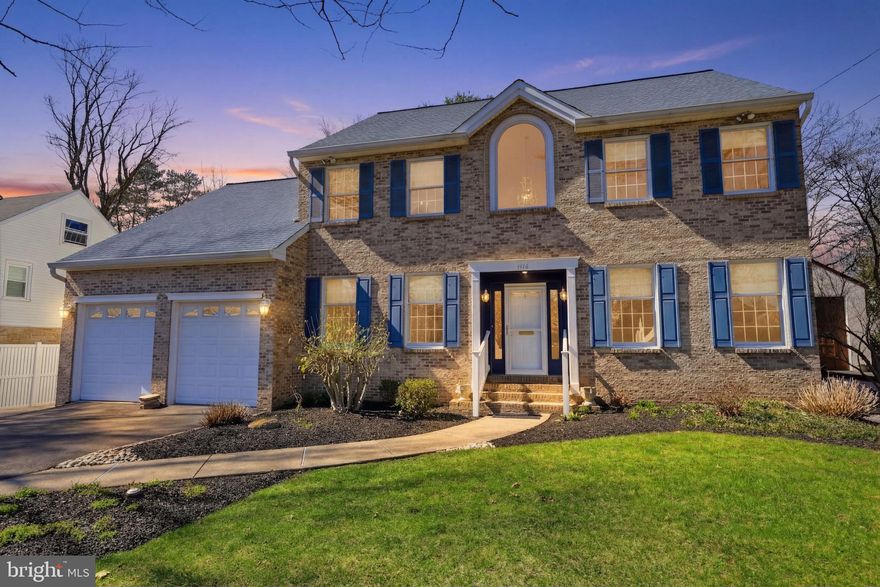 Welcome home to this beautiful brick-front Center Hall Colonial in the prestigious Highland Farms community. Enter into the impressive two-story foyer flanked by a formal dining room and a spacious living room featuring a gas fireplace with elegant wall sconces and French doors leading to the inviting family room with a built-in wet bar, mini refrigerator, custom shelving and storage & surround sound.
The first floor also boasts a large eat-in kitchen with chair rail, stone floor, recessed lighting, granite countertops, a custom island, dishwasher, garbage disposal, gas oven, microwave, refrigerator,  a built-in pantry. and a first floor powder room.  A versatile flex room with its own private entrance offers endless possibilities and can be used as a home office, bedroom, or playroom.  French doors lead to the private rear yard featuring a large custom deck with pergola, built-in benches and planters, and custom lighting—perfect for relaxing or entertaining.
The second floor features a spacious primary suite complete with a large bedroom, walk-in closet, sitting room, and a private bath with double vanity, Jacuzzi tub, and walk-in shower. The hall bath has been updated with a custom vanity, new countertop, and ceramic tile flooring. Three additional generously sized bedrooms with double closets complete the second level.  The home also features a full basement with a full bath, laundry room, and ample storage space.
Amenities include central air, recessed lighting, Andersen Windows, gas fireplace, large deck with Pergola, built in benches and planters, 2 car garage, new gas hot water heater, built in pantry, s/s appliances and more.
This exceptional home offers space, comfort, and versatility both inside and out. Conveniently located near shopping, dining, and major commuting routes.