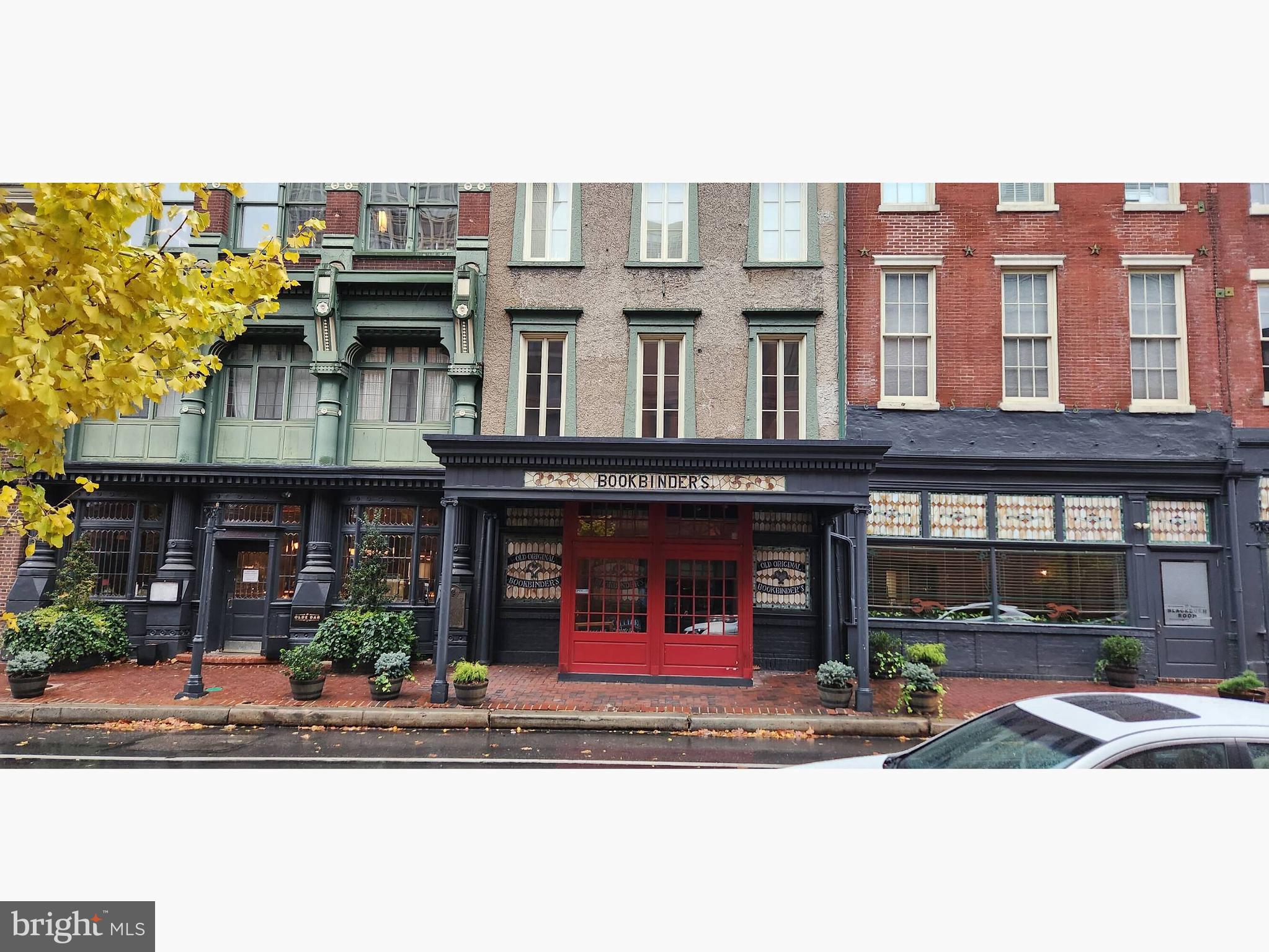 Iconic Philadelphia bar/restaurant located at 2nd & Walnut Street, available for sale (building only). A prestigious property located in Society Hill on the cusp of Old City. Step inside where you’ll be greeted by the grandeur of an opulent “original” wood bar accompanied by magnificent ceramic tiles, plenty of lights and colorful dining booths. The dining area seamlessly extends through an authentic ship’s wheel to a versatile space that is used for banquets and private events or additional dining space. On the other side of the bar, you’ll find a cozy space with a private entrance that can be utilized as a cigar lounge, banquets/ private events, or just additional dining space. This space features its own bar and a private room designed to be the wedding suite.
The tiled restrooms are spacious, elegant, & stylish.
The kitchen is ample at 2,800 square feet, featuring 5 walk-in refrigerators/freezers, separate prepping area, generous cooking and grilling area and separate dishwashing room.
This landmark property boasts close to 13,000 square feet of versatile space presenting endless possibilities for the future. It can accommodate seating for up to 387 guests at a time.
On the lower level you’ll find 2 office spaces, essential for running the business, and a powder room for the employees and plenty of storage space. Mechanical, boiler, transformer and fire pump room are also located in the lower level.
An additional walk-in refrigeration box used for beer kegs and beverages is located in the basement.
2 sets of doors will ease the basement access from the street for deliveries.
Layout works beautifully for a speakeasy, dance club, or elegant catering.
Liquor license is available for an additional fee. Lease option available - call for details.
Space is part of Moravian Condominium. One block from the Chestnut St Penn’s Landing ramp & the Seaport Museum and River Rink. One 1/2 block from the anticipated Walnut Bridge connecting Penn's Landing with Walnut Street and one 1/2 block from the Ritz Movie Theater, Society Hill Towers and adjacent to the Marriott Hotel.
Schedule a showing today to explore the possibilities that await you and don’t miss the chance to own a piece of Philadelphia’s history.