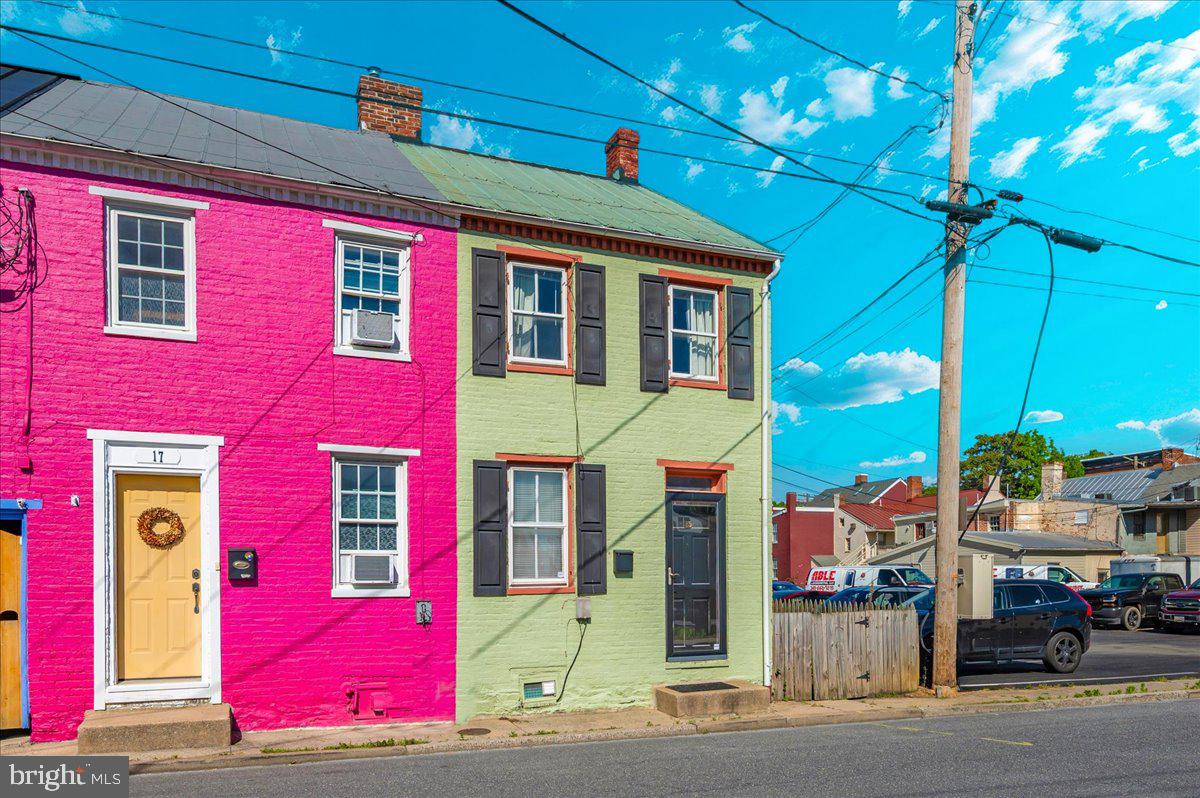 Welcome to your new oasis in historic Downtown Frederick. This delightful two-bedroom, one bath home perfectly blends charm and modern convenience, offering a vibrant lifestyle just blocks from local shops, cafes, and cultural attractions. As you step inside you'll be greeted by a bright and airy living room that invites relaxation and warmth. The adjoining dining room is perfect for entertaining or cozy family meals. The kitchen features access to a quaint courtyard/ side yard area, perfect for summer barbeques and outdoor gatherings, enhancing your home's charm and usability. Venture upstairs to find two bedrooms and a full bath. Stairs in the second bedroom lead to a finished loft space- an ideal nook for a home office, additional storage, or playroom, providing extra versatility that perfectly fits your lifestyle and needs. With ample off-street parking, this home combines convenience with the allure of downtown living. The small but lovely courtyard area is not just an extension of your home; it's a serene space to unwind.
Don't miss your opportunity to enjoy a piece of Fredericks rich history while enjoying the modern comforts of home.