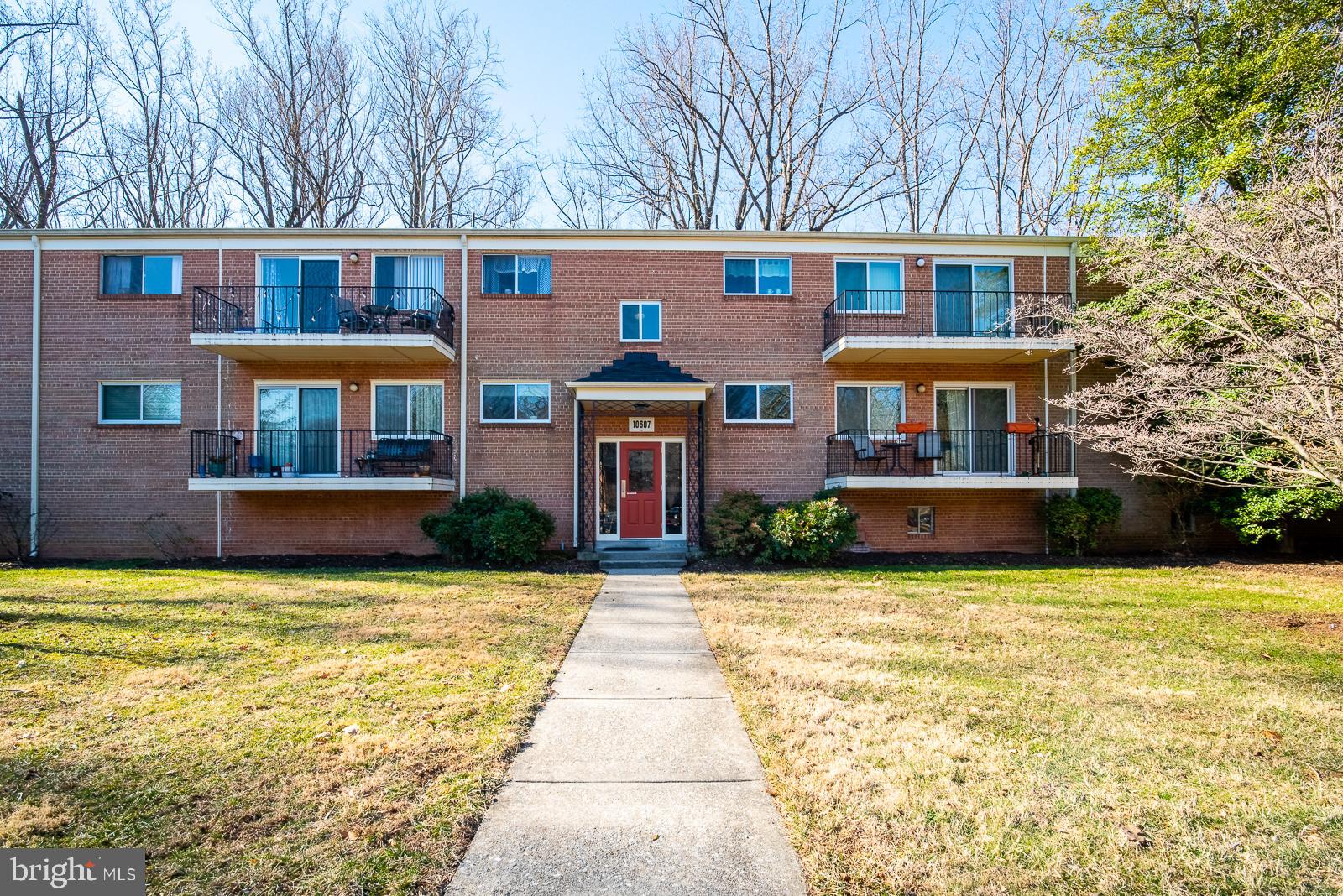Updated & light-filled 2 bedroom home in the desirable Parkside community! Open concept floor plan features a large living, dining, and kitchen area with hardwood floors throughout. Spacious living includes wide open views of the outdoor patio space backing to grassy area with trees & garden beds. Great for entertaining & relaxing outdoors! There's an updated bathroom with a tile surround and glass door, updated kitchen with gas cooking and lots of closets with great built-in shelving. Walk-in closet in the primary bedroom. 2 spacious bedrooms with hardwood floors as well! New Recessed wafer lights with 5 adjustable light color settings (cool to warm) installed in the living room and kitchen! This unit is conveniently located on the same floor as the washer/dryer room, trash room, and the only adjacent “unit” is the storage room (so no neighbors!). Located minutes from the Rock Creek Trail, shopping, & Strathmore Metro. This is a newer 1981 building with HVAC units and not the older heat/AC window units! 1077 Sq ft with low condo fees covering ALL utilities including a storage space. Don't miss it!
