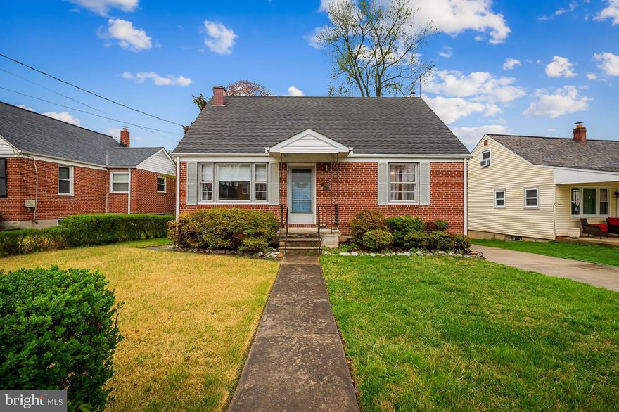 Welcome home to this fantastic Parkville Cape Cod with endless potential and room to add tons of immediate equity! This home is nestled on a quiet side street in a desirable neighborhood, yet is very close to all of the shopping, restaurants and access to major transit routes that Parkville has to offer! Enjoy a large 2-car driveway and a beautiful front yard leading up to the covered front porch.  As you step inside, you will notice that this home is drenched in natural light and boasts a meticulously maintained slate floor entryway as well as gorgeous hardwoods throughout most of the main level! Enjoy 4 generously sized bedrooms (2 on the main level and 2 bonus bedrooms upstairs) and 3 full bathrooms (2 on the main level and 1 bonus bathroom upstairs) as well as a "half" bath in the basement utility area. The interior is much larger than it appears from the outside with ample living space that includes a living room with a wood stove, a large dining room off of the kitchen and a 10'x15' addition off of the rear of the main level creating a large second living/family space! The kitchen is light and bright with white cabinets and appliances. On the main level you will also find a large laundry/mud room making laundry easy and accessible.  The basement is unfinished, yet large and offers access to the insulated crawl space and an additional exit to the large back yard. This space has tons of storage and incredible potential to be finished in the future to add additional square footage and value to the home! The seller cannot wait for you to see this beautiful, well cared for property. Schedule your showing now as this one will not last long.