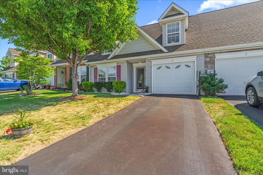 Enjoy low-maintenance living in this beautifully maintained 4-bedroom, 3-bath villa located in a desirable 55+ community just a short walk from Maple Run Golf Course. Featuring an open floor plan and soaring ceilings, this home offers a spacious and airy feel throughout.

The main-level owner’s suite provides convenience and comfort with a large walk-in closet and private bath. An open second-floor walkway overlooks the main living area, adding architectural charm and an abundance of natural light.

The kitchen and living spaces flow seamlessly to a beautiful patio with mountain views — the perfect spot for morning coffee or relaxing evenings. Recent updates include newer appliances and a newer HVAC system for added peace of mind.

With generous living space, thoughtful design, and a prime location close to golf, dining, and community amenities, this villa offers the perfect blend of comfort and lifestyle.