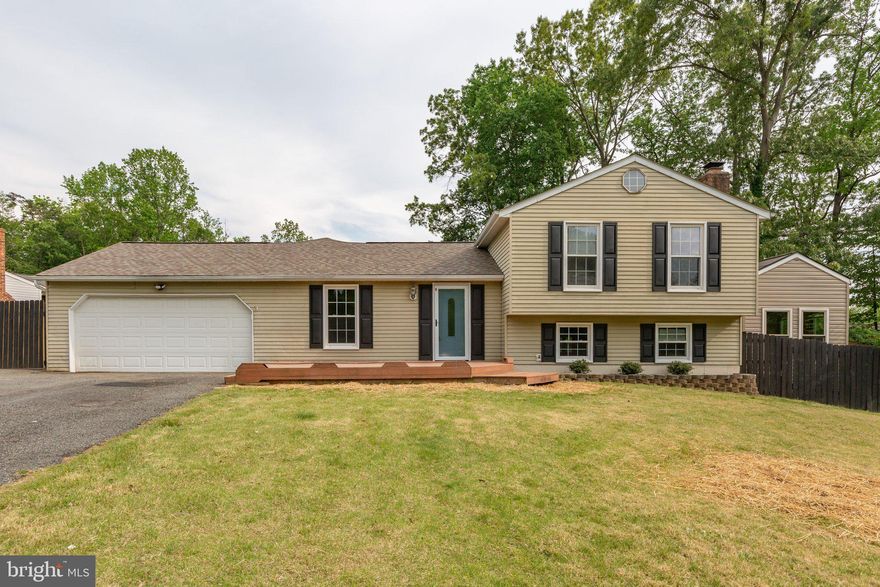 $10K PRICE REDUCTION!!  Great Location!  Located mins from I95 and multiple commuter lots in northern Stafford County.  This 3 bedroom, 4 bath home is great for entertaining!  First start with the kitchen which offers a large oversized island, plenty of storage space and stainless steel appliances.  There are 2 master suites, one located on main level and another one on the upper level.  The basement offers a large rec room with fireplace and another full bath.  Enjoy your evenings on your large oversized deck and fully fenced rear yard.