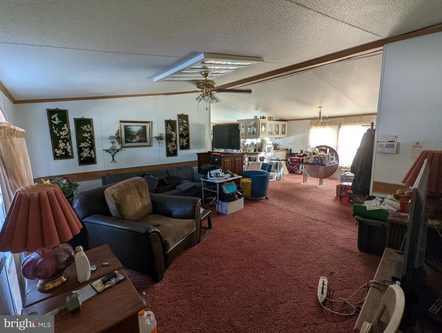 Bring your handyman skills! This is a fixer upper special. Doublewide home in the Arundel Meadows Community. Currently being cleaned out. 

The lot rent in this community is $1,200 a month. Must be park approved to live in the community. Two minutes from Arundel Mills Mall!