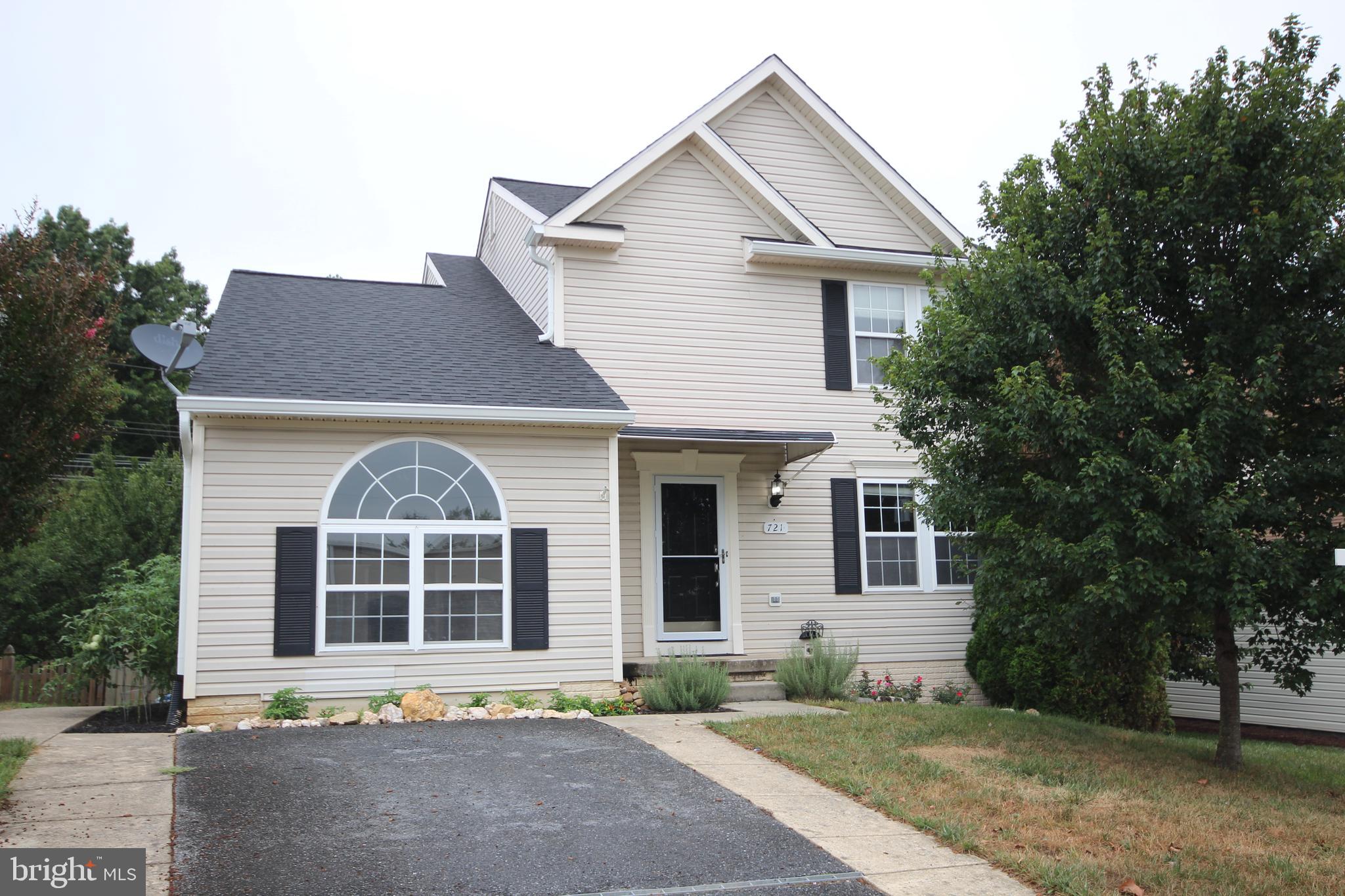 Beautifully UPDATED 5 Bedroom and 3.5 Bathroom Home with a WALKOUT BASEMENT! 3 Bedrooms and 2 Full Bathrooms on Upper Level and 2 Bedrooms and 1 Full Bathroom on Lower Level. Kitchen Updates include Granite Countertops, Stainless Steel Appliances and an Island. 270 SQFT BONUS ROOM ADDED (not reflected on tax record). There is a deck and covered porch (Hot Tub Conveys). Backyard has plenty of green space as well as backing to woods. Front Loaded Laundry units on Main Level. Less than 1 Mile to Downtown Brunswick and the MARC Commuter Train. NEW 35-YEAR ARCHITECTURAL SHINGLE ROOF 2025. NEW HVAC SYSTEM 2025. WATER HEATER ONLY 5YO. Must See this beautiful home!