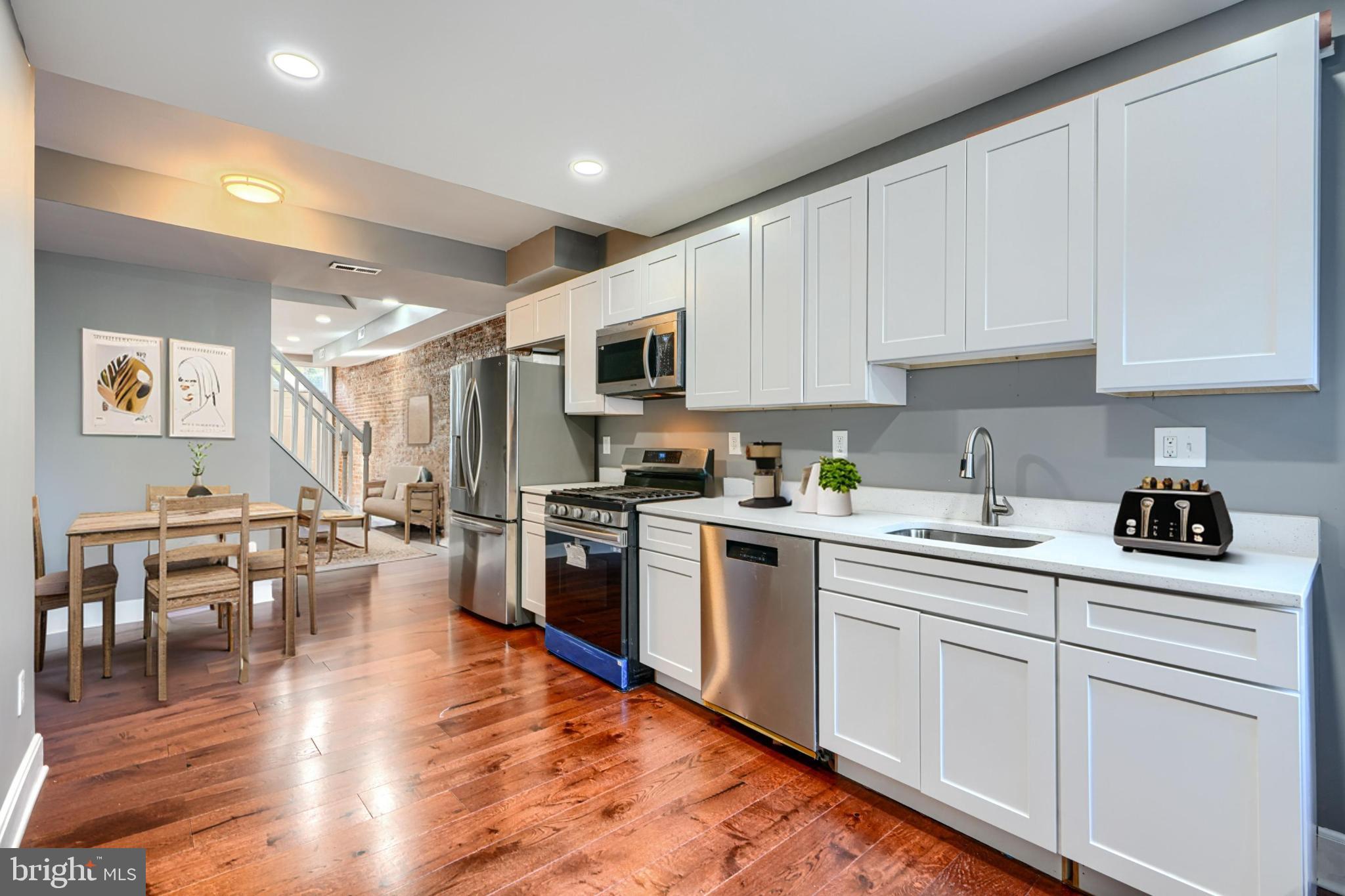 Live in the beautifully historic and well-established neighborhood of Union Square. This home features 4 bedrooms and 3.5 bathrooms, with a partially finished basement that could serve as a bonus room or flex space. The laundry room is conveniently located on the main level.
The home's double-pane historic wooden windows are custom replicas of the originals, allowing the façade to maintain its historic charm while offering modern energy efficiency. This home also boasts an interior exposed-brick wall on the first level.
Enjoy the convenience of being near many of Baltimore’s top amenities and attractions, including Union Square Park, the B&O Railroad Museum, the National Aquarium, Topgolf, Horseshoe Casino, and the University of Maryland Medical Center.
Save on property taxes over 10 years with this fully renovated, CHAP tax credit–approved property! A CHAP Credit of $3500 per year is currently being received for the property to maintain the taxes as they currently are - this credit is capped at $50,400! 
Whether you're a first-time homebuyer, investor, or simply looking for a great deal, this home offers incredible value. The CHAP tax credit keeps property taxes low for the next 10 years. You may also qualify for up to $25,000 in homebuying grants, including: Buying into Baltimore ($5000), FTHBIP ($10,000), and Baltimore City Employee Homeownership ($10,000) - possibly others as well! Contact me for more information on how affordable this property can be for you! Seller is motivated, bring us a deal! We are willing to offer concessions if needed.