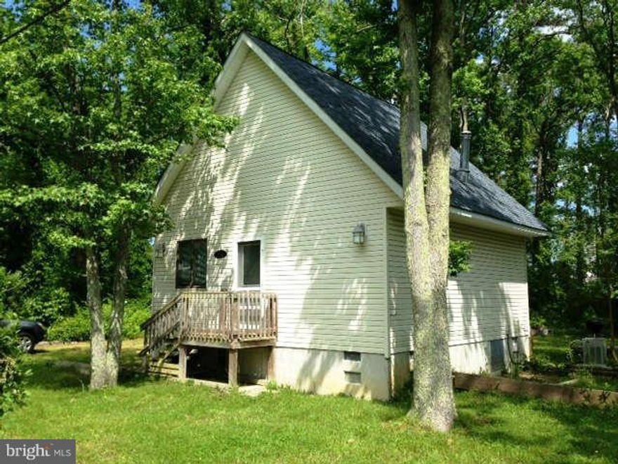 Cozy cottage one block off the Chesapeake Bay for rent. Walking distance to community private beach.  Seasonal water view.  Screened in porch and two storage sheds.  Located just 14 miles south of Gate 3. Easy commute to PAX and Webster Field. Also available for sale.