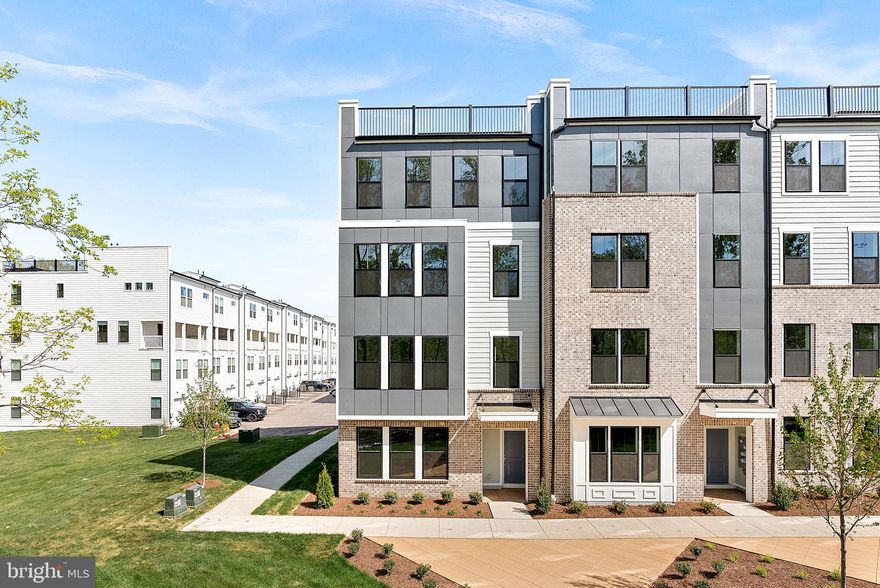 Introducing this brand new, two-level Rosslyn condo that blends functionality and comfort all together. Enter through your one-car rear-load garage or your front door. The main level features luxury vinyl plank flooring and offers an open-concept floor plan. Recessed lights compliment the family room and the modern kitchen includes upgraded pendant lighting, quartz countertops, stainless steel appliances, and a walk-in pantry. A conveniently located powder room also compliments this level. The stairs and second level include upgraded carpeting. The primary suite features a tray ceiling with added recessed lighting, two separate walk-in closets, and a primary bathroom to include a frameless shower glass door with a bench, quartz-topped dual-vanity sinks, and upgraded tiling throughout. The laundry room is conveniently located right off of the primary, making laundry day a breeze! The large second and third bedrooms are right down the hall and share a full hall bathroom also with upgraded tile throughout and quartz-topped dual-vanity sinks. This specific lot faces trees and greenery, so you don't have to worry about neighbors in front of you. Kincora is conveniently located right off of route 28 and a short drive to route 7, Dulles Airport, Dulles mall, grocery stores, and so much more!