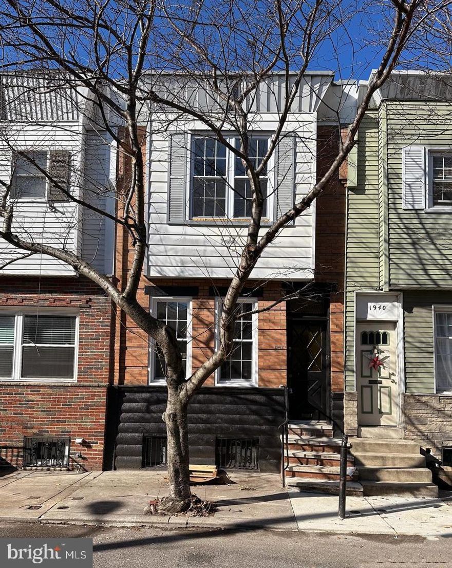 Welcome to 1942 Galloway Street. Located on a quiet street in the Pennsport neighborhood of South Philadelphia.  Awaits this spacious 3-bedroom, 2 full bathrooms home with a spacious living/dining area feature original pine flooring, waiting to become home sweet home, or a valuable investment opportunity. With its kitchen designed with a chef in mind, and its 1st full bath and washer & dryer hook-up on the 1st floor level, helps make the most mundane chores easy breezy.  Leading to its large yard, with ample space for hosting, or just enjoying the comforts of the outside world in the safety of one's private yard.  If looking for ample space on the inside lets traverse to the spacious basement, with an enough of space for storage, and still enough room for a home office, a play area, or one's private gym, truly the possibilities are endless. Then on the top floor we have the main bedroom, the main bath and the 2 nicely sized additional bedrooms, all sporting great closet space.  Do not waste time make you appointment now!! A property like this is sure to go fast.