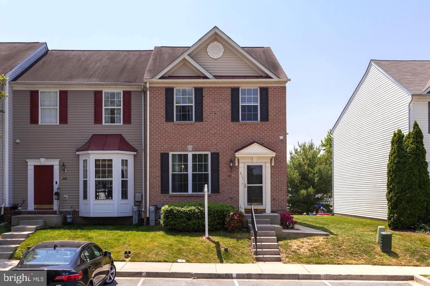 SPACIOUS EOG TOWNHOUSE WITH WALKOUT BASEMENT AND HIGHLY RATED SCHOOLS! This brick front EOG townhouse has 3/4 bedroom, 3 1/2 bath with fully finished walkout basement, high ratings per Great School, and close proximity to clubhouse and community pool! This spacious home has desirable open floor plan, 3 level bump out, and large lot backing to open space and pool. Main level includes huge living room with new flooring, powder room, eat in kitchen with gas cooking, Corian countertops, 42″ cabinets, walk in pantry and breakfast bar with space for seating. Bonus area can be used as sunroom, morning room, office or dining. Upstairs includes the beautiful master suite with sitting area, ceiling fan, walk in closet and updated private bath. Second and third bedrooms upstairs feature ceiling fans and plenty of closet space. New carpet throughout. Fully finished lower level has gas fireplace, bonus room that could be office/ 4th bedroom, full bath, and laundry room. Spacious wood deck with concrete pad. New roof (2021). HVAC (2020), HWH (2021), electrical panel (2021). Many additional upgrades throughout. HOA includes pool membership and use of beautiful community center. To be Sold in AS-IS condition.