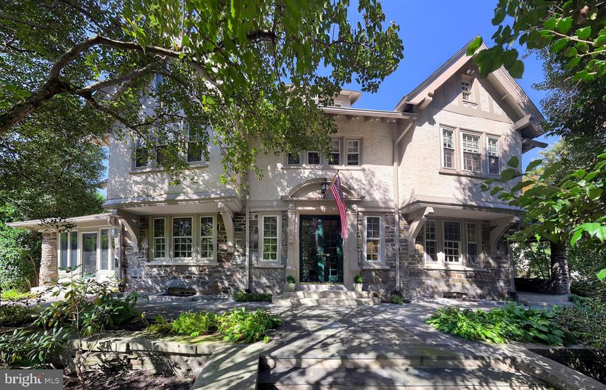 Welcome to 122 Mill Creek Road, a stately stone Colonial home brimming with original character and versatile living spaces. This expansive property features at least 5 bedrooms and 4.5 baths, with numerous additional rooms that can be tailored to your needs—whether as bedrooms, offices, or hobby spaces. Situated on .52 acres, this residence offers a unique combination of historic charm and boundless opportunity.

This home offers the convenience of being within walking distance to Suburban Square, a premier lifestyle destination featuring a curated mix of retail and unique dining options.   Additionally, the nearby Ardmore train station provides a short ride to Center City Philadelphia, enhancing your lifestyle with easy access to urban amenities.  

Upon entering the home, the first floor greets you with a grand foyer, leading to a spacious living room, formal dining room, and a sunroom that invites natural light and tranquility. The kitchen and family room are thoughtfully positioned at the back of the home, offering a seamless flow for entertaining. A powder room completes this level.

The second floor boasts 5 bedrooms, including a sunroom off one that makes for a perfect office or sitting area, along with 3 full baths and a convenient second-floor laundry.

The finished third floor provides 4 additional rooms and a full bath, with two rooms currently configured as offices. This home also features six fireplaces, adding warmth and character throughout.

The detached garage includes a finished space above, complete with an old clawfoot tub and roughed-in plumbing—ready for your renovation vision.

While this home does not have air conditioning, it is equipped with gas heat. With its timeless moldings, detailed craftsmanship, and abundant potential, this property is a rare opportunity to create your dream home in a storied setting.