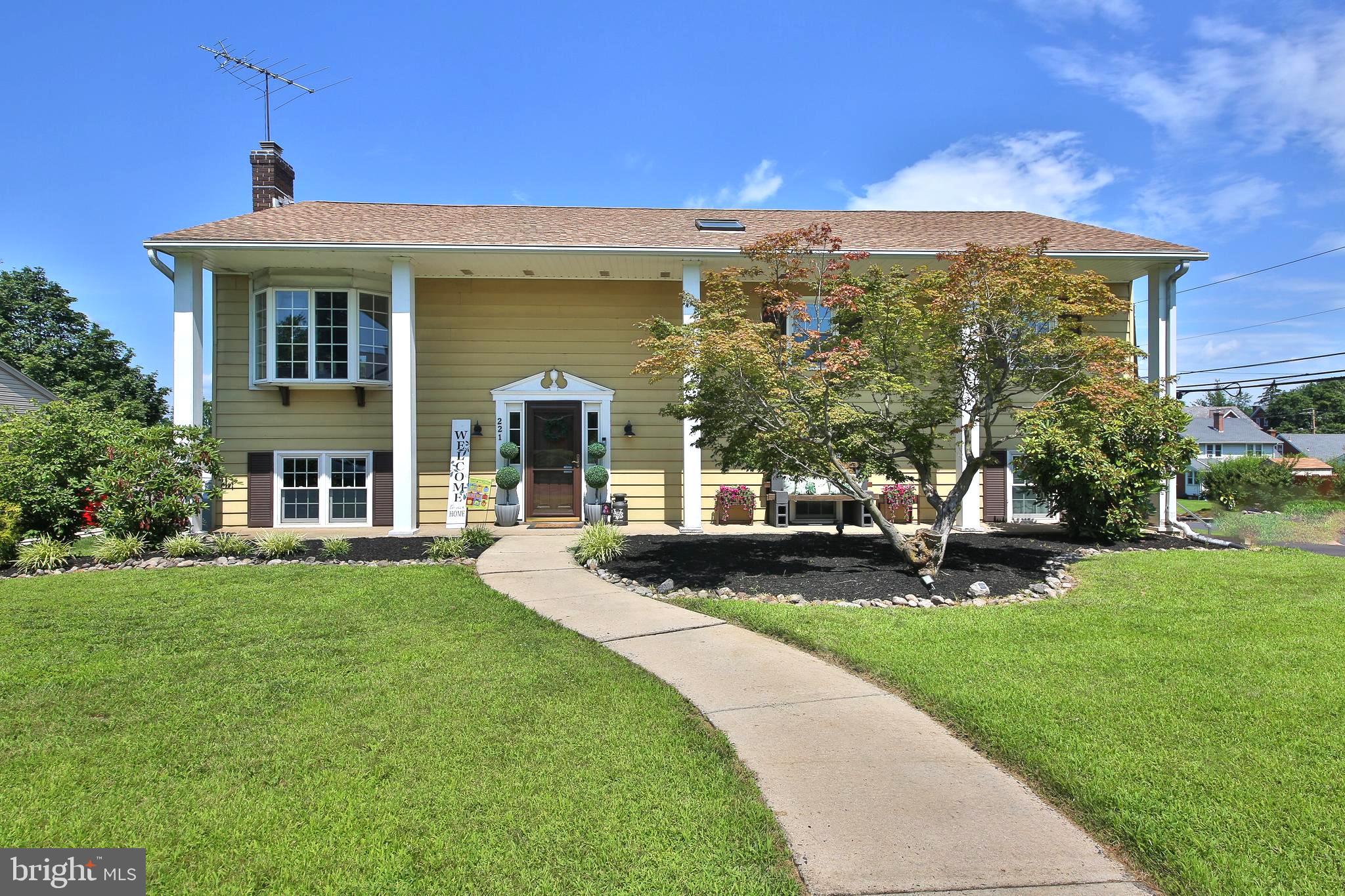 Immaculate Bi-Level Home in Charming Souderton Borough, A Truly Must See!
Welcome to this beautifully maintained bi-level home, perfectly situated in a peaceful neighborhood in the heart of Souderton Borough. This move-in-ready gem boasts an updated eat-in kitchen featuring sleek quartz countertops, engineered tile flooring, recessed lighting, newer appliances, a built-in microwave, and a spacious pantry. The adjacent living and dining rooms are filled with natural light and enhanced by crown molding, chair rail accents, and gleaming hardwood floors that flow throughout the hallway and all three main-level bedrooms. Step through double glass doors in the dining area to a raised deck—ideal for outdoor meals or relaxing with sunset views. From the deck, head down to a newly added paver walkway and patio area with a built-in firepit—perfect for summer barbecues and evening gatherings. The beautifully landscaped, fully fenced private backyard completes the inviting outdoor space. The main level features a spacious primary bedroom with double closets, two additional well-sized bedrooms, and a large full hall bath. The expansive lower level has new carpet and offers a versatile family and recreation space, anchored by a charming brick hearth fireplace with a propane insert making it a cozy retreat during colder months. Sliding glass doors provide easy access to the rear patio and yard, creating a seamless indoor-outdoor living experience. A recently added office area is ideal for remote work, and a full bathroom with a walk-in shower, separate laundry room, and interior entry to the oversized two-car garage. The garage includes workbenches, ample storage, and utility space—perfect for hobbyists and DIYers. Freshly painted in warm, neutral tones and flooded with natural light, this home is truly move-in ready. Notable Updates: Roof (2018) Heater & A/C (2018) Water Heater (2020) Upgraded 200 AMP Electric Service. Prime Location: Enjoy a short stroll to local shops, dining, parks, and schools, plus easy connections to major commuter routes—all while enjoying the comfort of a quiet, residential setting.