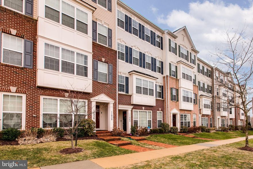 Very well maintained upper level condo in sought after Arora Hills community.  New carpet and fresh paint throughout the entire home.  Beautiful customized premium wood shutters are installed for all windows, which adds an upscale touch! Hardwood floor throughout sun-filled living room and dining room. And a study off-living room is perfect for a home office. Gourmet kitchen with granite counter top and tall cherry cabinet. Cozy family room features a gas fire place. 3 large bedrooms on the top level with washer and dryer on the same level.  Upgraded master bedroom has a separate shower and a large triangle tub. Enjoy the townhome living style without worrying about any exterior maintenance. One car garage is attached and access from rear. Lots of community amenities including several pools, playground, parks, trails plus more. Close to bus stop and only 5 minutes walk to community shopping areas anchored by Harris Teeter.  Overall a great home in a wonderful community!