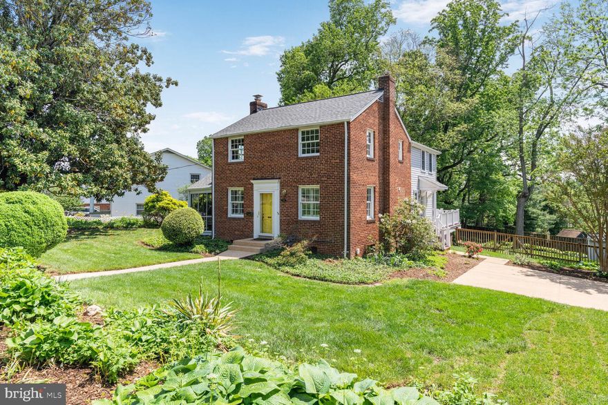 Offer Deadline 2pm Monday 5/12. Beautifully updated Colonial on 1/3 acre in Falls Church in the Mclean HS Pyramid. Set on a generous lot, this expanded 4-bedroom, 3.5-bath Colonial offers space, style, and unbeatable location. A brand new roof was just installed and the whole house has been freshly painted. The main level features a formal living room with recessed lighting, wood-burning fireplace, and hardwood floors that seamlessly connects to a screened porch and a spacious formal dining room. The open-concept kitchen offers upgraded countertops, stainless steel appliances, recessed lighting, and flows into the inviting family room with built-ins and a second wood-burning fireplace. A bright breakfast room leads out to a large deck overlooking the fully fenced backyard—perfect for outdoor living. Upstairs, the large primary suite includes two walk-in closets with custom built-ins and an ensuite bath with soaking tub, separate shower, and dual vanities. Three additional bedrooms share a full hall bath. The walk-up lower level offers a rec room, full bath, laundry room, and an oversized unfinished storage area—ideal for future expansion or workshop. Just steps to the W&OD Trail, less than 2 miles to West Falls Church Metro, and minutes to Mosaic District, Falls Church City, I-66, and I-495.