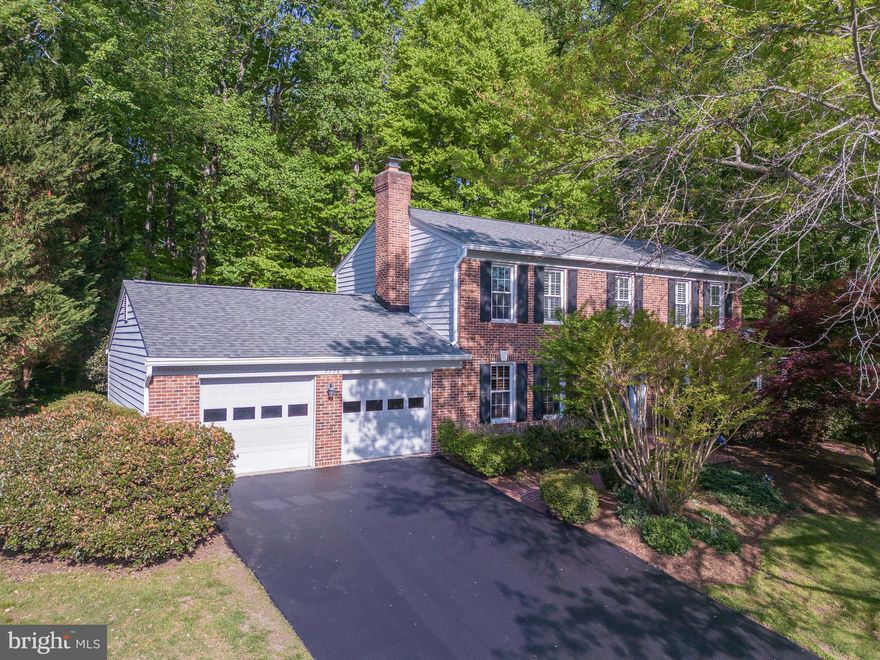 Offered in "as-is" condition, this is your opportunity to own in the highly sought-after South Run community of Fairfax Station. On over a half acre, this home offers the perfect blend of natural beauty, space, and convenience. Surrounded by mature trees and just moments from scenic trails, parks, and recreational amenities, the neighborhood is known for its peaceful setting and strong sense of community. Residents enjoy easy access to the South Run Recreation Center, Burke Lake Park, and major commuter routes, making it an ideal location for both relaxation and connectivity. With its established charm, spacious homesites, and proximity to top-rated Fairfax County schools, South Run continues to be one of Northern Virginia’s most desirable places to call home. Featuring hardwood flooring throughout the main level and primary suite, with newly installed carpeting on the stairs, upper hallway, and additional bedrooms. The eat-in kitchen is appointed with granite countertops.  The cozy family room includes a wood stove insert, mantel, and brick wall. The home is enhanced by upscale trim details throughout, and complemented by plantation shutters on the windows. A main-level study offers flexibility and may serve as a fifth bedroom.  Roof replaced in 2022. Windows and siding replaced in 2008/2009.