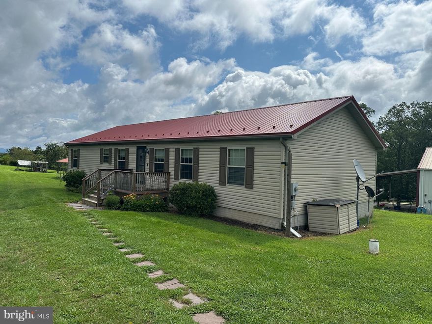 Nice 3 bedroom 2 bath modular ranch home with full basement situated on 13.51 acres with fruit trees. the home has all appliances new within the last 5 years, oil forced air heating and CAC, newer front porch, rear deck, additional office/den space on lower level with laundry area. there is also a separate large pole building garage with 2 bedroom hunting cabin area inside. there is also a full bath and small kitchen in the hunting cabin area leaving ample room for all you toys and several cars. Property also has equipment shed and carport. Wooded area behind the home backs to state game lands. Electrical panel is set up for use with generator which conveys in case of power outages.