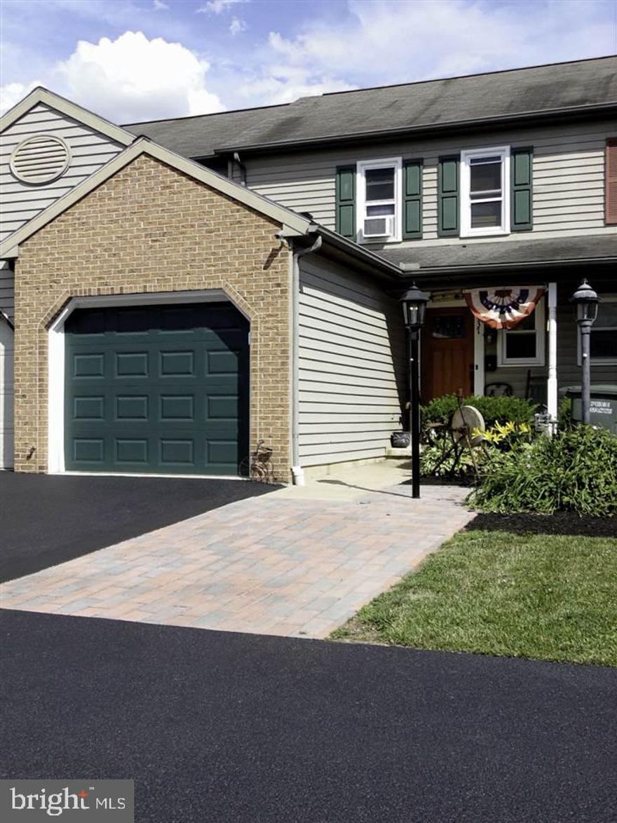 Charming 2 story townhome, conveniently located to shopping and schools.  Home is located in Dover.  You'll enjoy this 2 bedroom home that offers a laundry room  and a 1 car garage with additional parking area.  This home also has a partially finished basement .  Enjoy the outdoors and entertaining on the deck and patio.