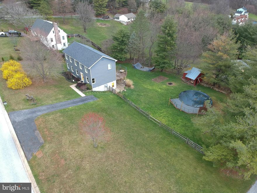 SELLER HAS FOUND A HOME  &  just reduced their home significantly for your advantage!   Don't wait call today, so much space and options with this open floor plan, for any buyer.  More than just a home this creative two story offers many opportunities for your living style, wide open floor plan upstairs as wells as the first floor allows for you to make this home your own!  Large rooms thru-out in this rebuilt colonial in 2015, all brand new in a mature neighborhood with great yards and convenience to town. Gorgeous newer kitchen with soft touch cabinets, marble countertops, beautiful farm sink, stainless appliances, pantry, slider to deck and even an extra hand sink for extra options to clean up!   More open space to use as you please, could be sitting room, library, dining, or extra comfy room adjacent to Kitchen. First floor bedroom for your choice as well as large bath.  Dining area is set up aside the family room offer the warm glow of the pellet stove and  great space for all. Two stairways to upstairs, one from kitchen, one from Family room,  for more open space, three LARGE bedroom with bath, bring your ideas and start carefree living! Super size it in the lower level with great access to the rear fenced yard with tons of outdoor living.  Start your summer enjoying the salt water pool, (half in half above) with small deck.  Sq.ft may be off on public record, should be 2550 total, please verify.  Extra toys will fit nicely in the one of kind storage shed with metal roof.  Sq. ft is estimated.