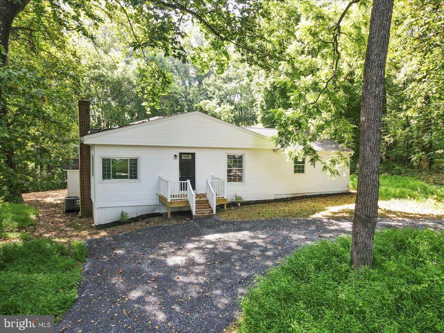 This property comes with 3 lots...mainly wooded with wildlife all around.  Remodeled in 2025 with new roof, new kitchen, new baths, new HVAC...it's ready to go...fresh paint and flooring!  Nice deck off the kitchen for summer relaxation in the shade and wildlife viewing.   Agent/Owner.