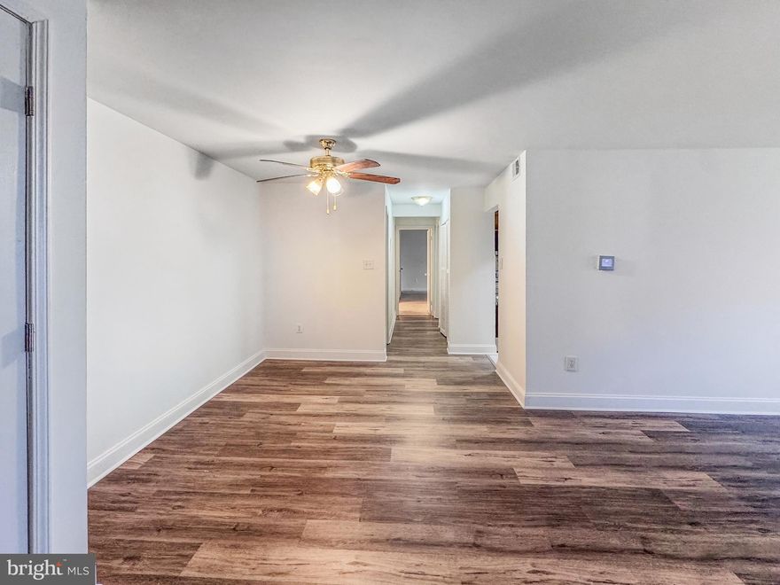 Spacious ground-level condo offering laminate floors throughout and an open, functional layout. This unit features two large bedrooms, a den that can be used as a home office or additional bedroom, two full bathrooms, and an in-unit washer and dryer for added convenience. Enjoy easy access with ground-floor living and a prime location close to shopping centers, dining, and public transportation. Fully available and ready for immediate occupancy.