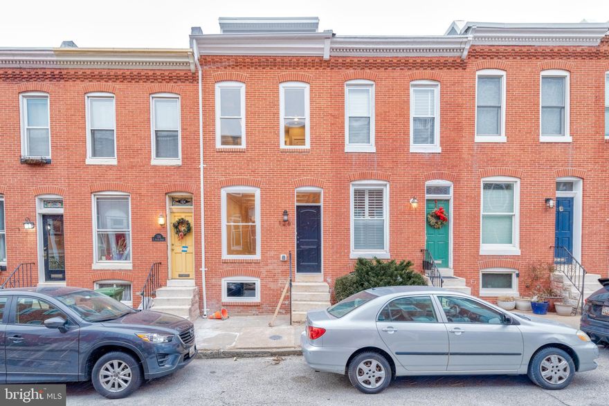 Gigantic 4-bedroom rowhome with 3.5 baths located in the heart of Federal Hill now available. Oversized parking pad for 3 vehicles. Fully renovated home with large kitchen, quartz countertops, and stainless steel appliances. Main level half bath. Exposed brick. Hardwood and tile throughout. Center hall access to roof deck with stunning views.  Centrally located full size washer & dryer. Close proximity to retail shopping, local dining, inner harbor, stadiums, and all major highways.  Schedule a private tour today.
