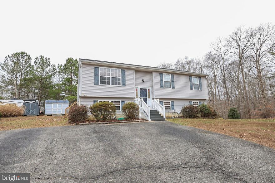 Nestled in a country setting, this 3 bedroom, 3 full bathroom home is ready for a new owner.   The home has been well maintained.   Large level 3/4 acre lot with a fenced back yard.  This home includes a living room and dining room off of the kitchen.   Sunroom off kitchen with door to  the outside.  Primary bedroom with a full bath and closet.  Two additional bedrooms and a full bathroom in the hallway complete the upper level.  As you enter the lower level, there is a rec room with a pool table that will convey, another full bathroom and additional finished room.  Doors open to covered patio and deck perfect for relaxing for an evening drink and barbeque.    2 Sheds and 1 enclosed storage area under porch.  Northern county location makes for easy access to those commuting north to DC or northern VA.  Close to schools, shopping and area amenities.  Schedule your online appointment today.