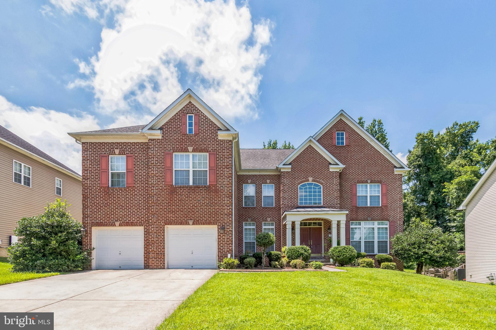 Located in Upper Marlboro, this stunning colonial offers 8,300+ sq ft across three levels with soaring ceilings. A grand two-story foyer leads to formal living and dining rooms, a private office, and a dual staircase. The gourmet kitchen boasts upgraded cabinetry, a large island, and a butler’s pantry, opening to a sunlit great room with a gas fireplace. Ideal for elegant living, entertaining, and multigenerational needs.
Upstairs, all bedrooms have walk-in closets and en-suite baths. The owner’s suite offers a sitting area, dressing room, oversized closet, and spa-style bath with soaking tub, glass block shower, and dual vanities. The finished walk-out basement includes a bonus room, full bath, wet bar, and private entrance. Enjoy a spacious mudroom, oversized garage, and easy access to I-495, National Harbor, Joint Base Andrews, DC, and VA. Luxury, space, and location—schedule your tour today!
