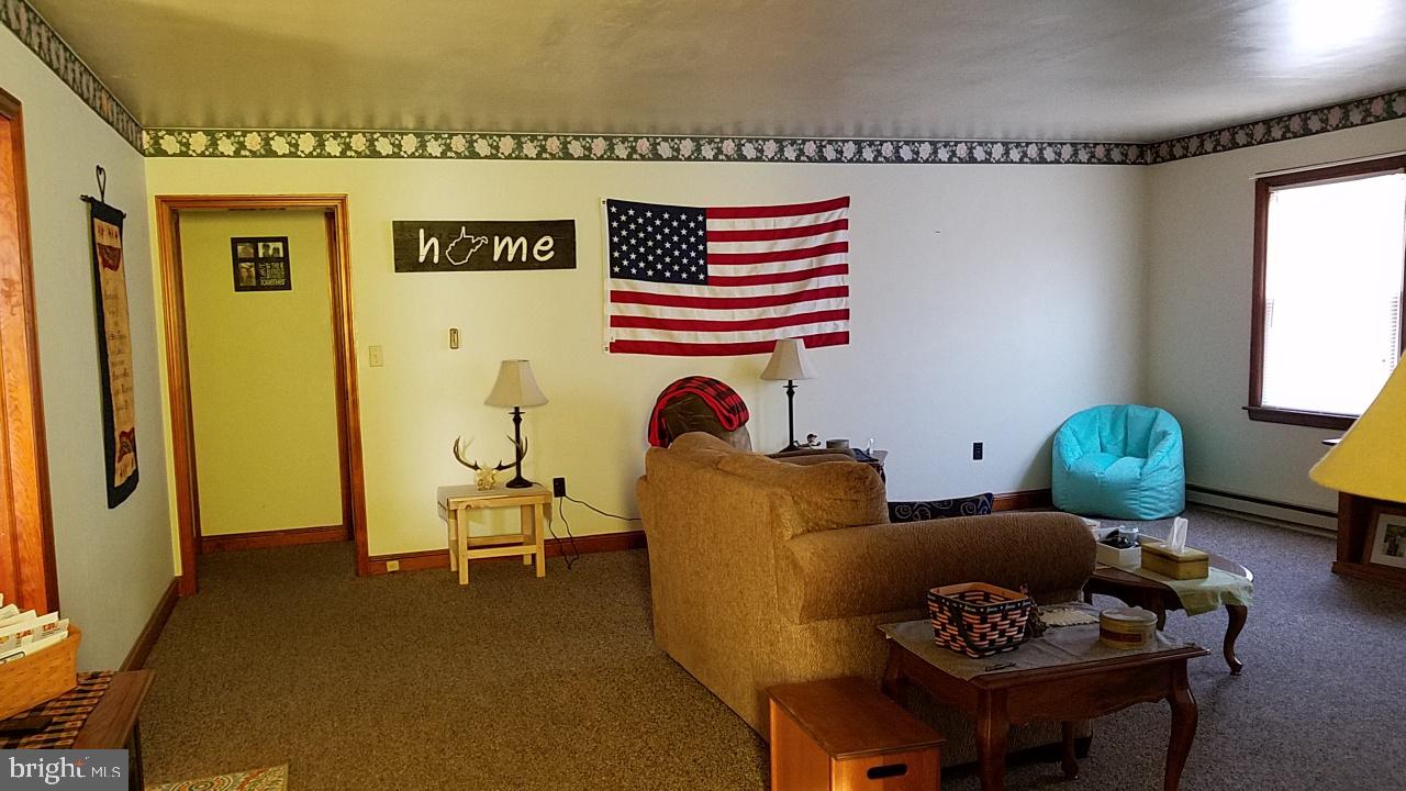 Spacious 2BR apartment above C.J. Florist shop. Wood floors, washer/dryer hook-up. Eat-in Kitchen. Private locked entrance to this well maintained quiet building to live in. Available July 7th. Applications being taken now. No pets, no smoking. $575.00 includes weekly trash pickup. Nice area to enjoy the town park, the outdoor town pool and lots of local activities.