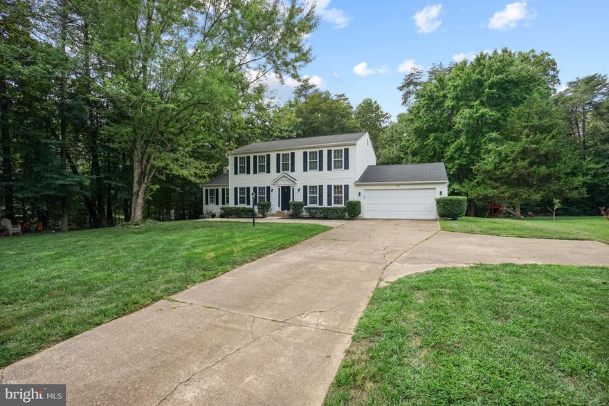 OFFER DEADLINE  By Monday, 3/18/24 at 9:00 am.  Introducing your dream home! NO HOA!! This magnificent single-detached gem boasts four spacious bedrooms, 3.5 baths, and a generous 3,976 sq ft of living space on a sprawling 1.002-acre lot. Step inside to discover the elegance of hardwood floors throughout the first floor. The living room and dining room set the stage for memorable gatherings. The family room, with its cozy fireplace, offers the perfect spot to unwind. The gourmet kitchen features stainless steel appliances and exquisite granite countertops. Step onto the patio deck to enjoy morning coffee or host barbecues in your backyard. Entertain in the fully finished basement with a rec room and fireplace. Updates include fresh lighting fixtures and replaced basement French doors. Recent upgrades provide peace of mind, with a new water heater and inside pump in 2022. This home offers a perfect blend of comfort, style, and serenity. Your new chapter begins here!