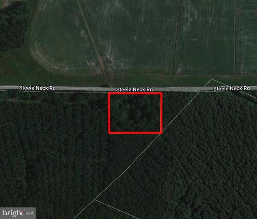 Nice 2 acre lot close to Vienna. The trailer has no value, old well & septic exist but needs to be replaced. Property is being sold "AS IS."