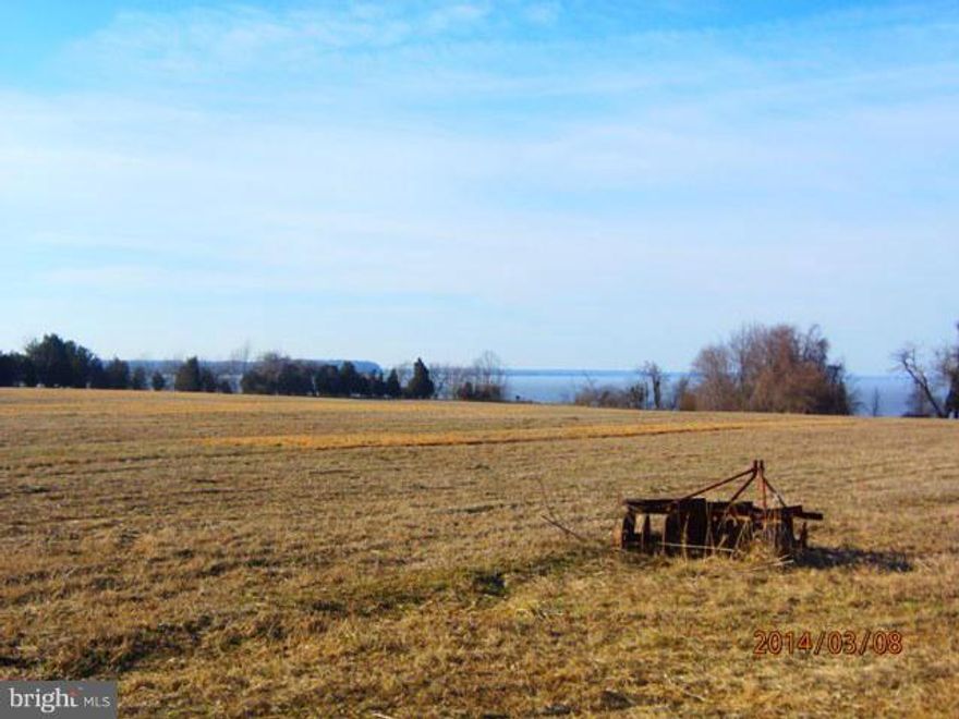 Fantastic rare opportunity build your dream home  on a beautiful serene setting overlooking the Potomac River. Currently  farming field  with access to the Potomac. Surrounded by private farms and very private location.  Views are overlooking Potomac in the Fairview Beach vicinity. Potential of subdividing, verify with King George County Zoning.  Purchaser responsible for roll back taxes.