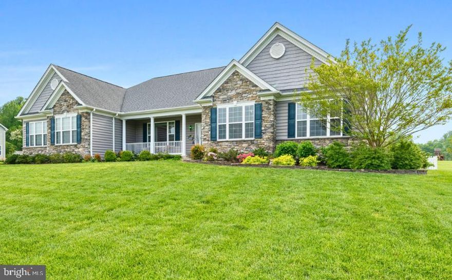 Welcome to Your Dream Home!  Discover this remarkable residence, featuring over 3,600 square feet of exquisitely designed living space. This home offers the best in one-level living and is situated in the highly sought-after Twin Ponds neighborhood in northern Calvert County! Featuring 4 bedrooms, 2.5 bathrooms, this property includes a formal dining room, a gourmet kitchen highlighted by modern appliances, granite countertops, a spacious breakfast bar, a center island, ample cabinetry, and a large, walk-in pantry.  The family room and sunroom both provide access to a screened porch that steps down to a level, fully usable rear yard, complete with a stamped concrete patio.  Down the hall, you will discover a primary suite featuring cathedral ceilings, a walk-in closet, and a luxurious bathroom equipped with a generous walk-in shower, a corner soaking tub, and dual vanities. On the opposite side of the home, the hall bathroom is adorned with ceramic tile and serves three generously sized secondary bedrooms.
The partially finished basement offers a recreation room and a full bathroom, along with an impressive amount of unfinished space that presents an opportunity for future expansion. Additionally, the home includes a convenient laundry room adjacent to the oversized two-car garage, a paved driveway, and a shed. This amazing residence is located within a highly ranked school district and is situated on a 1.14-acre lot, surrounded by other fine homes. The rear lot line extends 11' beyond the evergreens, providing additional space.