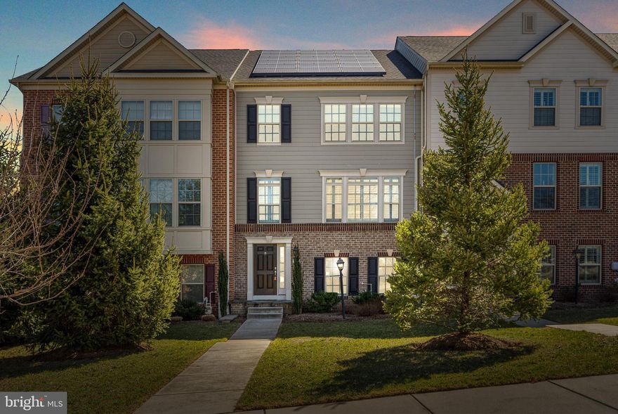Welcome to this stunning newly built townhome in the highly sought-after Hereford Zone! Energy-Efficient, featuring new solar panels, only paying $124/month— perfect for combatting rising utility costs, saving you money monthly! 12 month average BGE bill of $86.00 per month.  Step inside to a bright and spacious living room with beautiful engineered hardwood floors. A full bathroom with a custom tile stall shower on this level adds convenience, along with direct access to the 2-car garage. The main living level boasts an open floor plan, ideal for entertaining. The living room features crown molding and ample natural light, while the adjacent powder room ensures hosting guests is a breeze. The dining area is accented with new fixture, chair rail and wainscoting, adding a touch of elegance. The gourmet kitchen is a showstopper with 42” cabinets, granite countertops, double wall oven, arabesque tile backsplash, and 5’ island w/ overhand for additional seating—perfect for casual dining. Upstairs, the spacious primary suite impresses with vaulted ceilings, 2 walk-in closets, and a luxurious ensuite bath featuring dual vanities and a tiled walk-in shower. Two additional generously sized bedrooms offer large closets and share a full hall bath with a tub/shower combo. The laundry area on this level is clutch added convenience! Enjoy outdoor living on the deck off the kitchen, perfect for summer BBQs and gatherings! Conveniently located near Hunt Valley Town Center, York Road, Shawan Road, I-83, and a variety of shops and restaurants. Don’t miss this incredible opportunity — schedule your showing today!