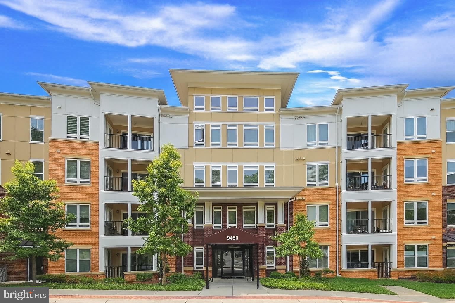 Experience refined living at The Enclave—Fairfax’s boutique luxury condominium community. This impeccably appointed 1-bedroom, 1-bath residence offers sophisticated style, custom upgrades, and a serene, wooded setting just minutes from the Mosaic District and Metro. Step inside to an open-concept layout filled with natural light. The gourmet kitchen boasts sleek 42” shaker cabinets, granite counter tops, subway tile backsplash, and high-end stainless steel appliances including upgraded Kitchenaid refrigerator. The modern finishes flow seamlessly into an elegant dining space enhanced with designer lighting and a stylish ceiling fan. The spacious bedroom features a walk-in closet, custom blinds, and an upgraded chandelier, while the spa-inspired bathroom offers a frameless sliding glass shower door and luxe finishes throughout. Additional highlights include: full-size, in-unit washer/dryer, assigned garage parking space, assigned storage unit, secure building access, on-site fitness center, club room, and professionally-managed grounds with firepit, grilling area, and nearby walking trails. Just 2 miles to Vienna Metro and moments to I-66, Rt. 50, and Tysons Corner, this home offers a rare blend of tranquility and convenience. Whether you're entertaining or unwinding, this polished condo is the perfect retreat.