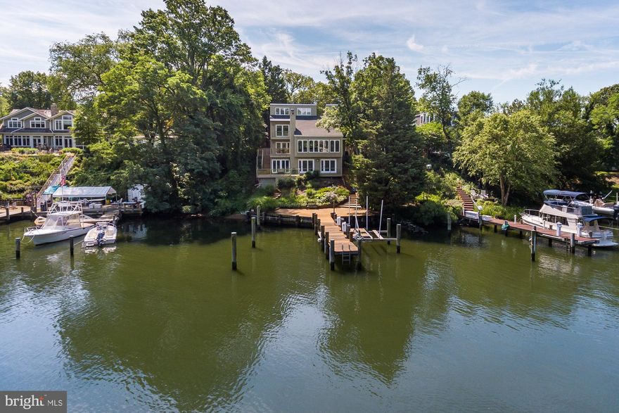 Enjoy a protected deepwater(6 ft) harbor for your sailboat and views of Spa Creek from this 4 BR contemporary home. Vaulted ceilings, skylights, most windows replaced, roof replaced in 2016. Deep water slip with lift, floating dock & multi level decks for outdoor living with extensive landscaping. Appraisers: House needed new siding and deck work. Kitchen and baths needed updating. Call list