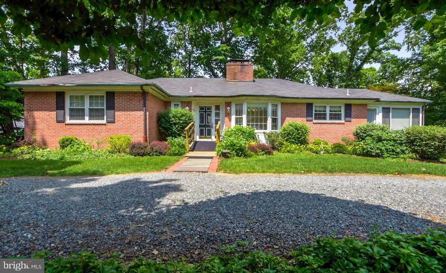 This 3BR/4BA gem has all the charm of a classic 1950 s home   ready for your customizations, designer touches or expansion!  Home sits on a lush .88 acre lot with private rear yard and pond.  The main level of the home offers an eat-in kitchen with separate formal dining room, sun room, library, living room and 3BR/3BA.  The lower level is a full walk-out level family room with fireplace, tons of windows, leading out to rear patio, another BR with full BA.  The attached garage makes it convenient for easy access.  This location is just minutes from Downtown D.C., Bethesda, Potomac, Chevy Chase and Arlington - including some of the areas  most sought after public schools and top private schools.