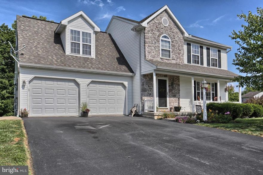 Beautiful home with eat-in kitchen and large island.  Featuring 4 BR, 2.5 BA, nice master bedroom and master bath,  large finished lower level.  Lots of storage in the heated oversized garage.  Enjoy the porch and deck living area backing up to the woods.  Schedule your showing today.