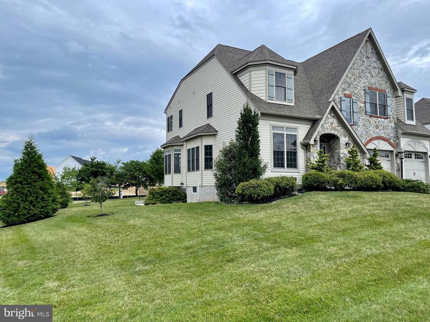 Stunning estate home in the premier, highly desired Wormald community of Beallair. This 5 bedroom 4.5 bath home with a fully-finished walk up basement is one of the larger homes in the neighborhood and the only one with the distinct Lambeth model. This eight-year-old home features brand new carpet throughout the entire top and basement levels along with fresh paint. Stately, impressive and elegance come to mind as you enter the home. The two story entry, 10 ft+ main level ceilings and 9 ft upper level ceilings, three bay windows on the main level and multiple transom windows in kitchen and breakfast area are definite wow factors. The elongated doors throughout the main level add to the distinct and gorgeous design. The main level consists of formal living and dining rooms, a large office with a closet, kitchen, breakfast area, family room, and mud room.  The basement boasts a media room, exercise/craft or playroom, very large recreation areas and a bedroom with a full bathroom and walk in closet! The washer and dryer and laundry sink are where they should be on the top level with four large bedrooms- all with walk in closets! Master bathroom boasts upgraded tile, his and her sinks and private toilet area. Special features of this home are double hung windows, dual zoned heating and air conditioning, whole house water softener, and reverse osmosis to the fridge, ice maker and the kitchen sink faucet. The premium large corner lot with views of the mountains features extensive and upgraded landscaping and an English Garden with a 2 tiered stamped concrete patio out back. The coveted gated community of Beallair with a beautiful tree-lined entrance offers walking trails, a creek, gazebo along with lots of common areas, Manor Clubhouse, activities for homeowners and most of all a maintenance free lifestyle. The low HOA fee of $199 includes lawn cutting, fertilization, weed treatment, front bed trimming, edging and mulching as well as trash, recycling, and snow removal on all neighborhood roads, and shockingly your driveway and your walkway to your front door! Future development of a community pool and clubhouse are among the plans of amenities to be added to this highly sought after community. The location is dynamic with so many cities less than 30 minutes (Frederick, Winchester, Leesburg, Ashburn, Martinsburg), 3 airports within 1 hour 15 min. and so close for commuting as well the Marc Train is within minutes. Why wait 18-24 months for a new build home of this size when you can have it now?