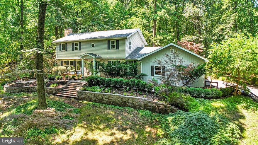 Welcome to 709 Fishing Creek Road. This beautiful private wooded retreat on  just under 2 acres is an entertainers dream. This property has just been extensively updated with attention to detail. Updates include a brand new roof, new carpet, new luxury vinyl plank, new outlets and light switches, new lighting, new bathroom vanities, new toilets, new tub, new mirrors, new dishwasher and fresh paint throughout. Mechanicals have now been updated as well - New septic tank, New HVAC with heat pump, New UV sanitizing light for the well, and new basement waterproofing system. After $150K in updates, this home has been thoughtfully updgraded, and is ready for your personal touches. When you enter the home from the extensively hardscaped front porch area, you find yourself in an impressive two story foyer, that opens to the living room and dining rooms. The huge living room with exposed beams and brick fireplace can accommodate your entire family and friends, with a slider to the back patio. The dining room is cozy, with a breakfast bar that has a passthrough to the kitchen. Your gourmet kitchen with Jenn Aire appliances (including an indoor grill!)  is in the back of the house, featuring granite countertops, a huge kitchen island, and more cabinet space than you can imagine. It also features a large pantry next to the large eat-in area. Off the kitchen is a quiet office space, although you could also use it as a hobby room. One step down from the kitchen is the laundry room that connects to both the backyard and the attached garage. It also features a nook for either an extra refrigerator or freezer, or a coffee/wine bar. Just off the laundry room is a tastefully updated half bathroom. Upstairs is an amply sized primary bedrooom with large walk in closet and updated bathroom with shower. Three good sized bedrooms complete the upstairs, and are served by a beautiful hall bathroom with double sinks and a brand new shower and toilet. The updated finished basement would be perfect for entertaining or as a family room or theater.  The attached garage is oversized with two garage door openers, and a separate workshop. Out back, there is a beautiful slate patio complemented by a stacked slate koi pond with waterfall. Other backyard features include a double gazebo that has a paver floor and is situated near an outdoor firepit overlooking the woods. Lastly, there is also a secondary garage or hobby shed, perfect for your riding mower, hobby car, or anything you can imagine. Located minutes from Route 83, this home is a quick drive to both York and Harrisburg, as well as other nearby amenities. Also, you are just down the road from the elementary, middle and high schools, for easy commutes. Don't miss this private wooded oasis that feels worlds away from everything, while actually being very convenient to many amenities.