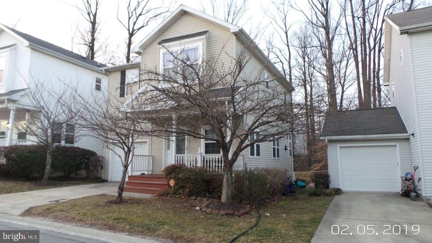 This Beautiful Detached home has so much to offer!! Premium Lot Backs to Woods!! Great yard space for entertaining including a deck in the rear and patio pavers. Interior has been updated and renovated to include Newer kitchen cabinets, newer wood floors, new carpets, large living and dining area and family room on the main level with fireplace. Large bedrooms on the third floor with a loft overlooking the downstairs family room. Cathedral ceilings on 2nd floor and 9ft ceilings on 1st Floor. Fully finished basement with lots of room for office area and workout area. Community amenities include walking trail, park with a pond, basketball courts, outdoor swimming pool, community club house and fitness center. Security gate at the front with 24 hour security services!!! Priced to sell!!