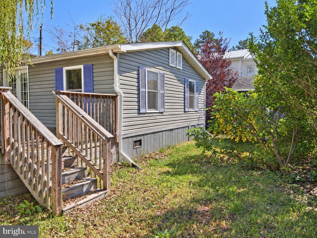 Photo of 28320 Forest Drive, MILLSBORO, DE 19966 (MLS # DESU2121830)