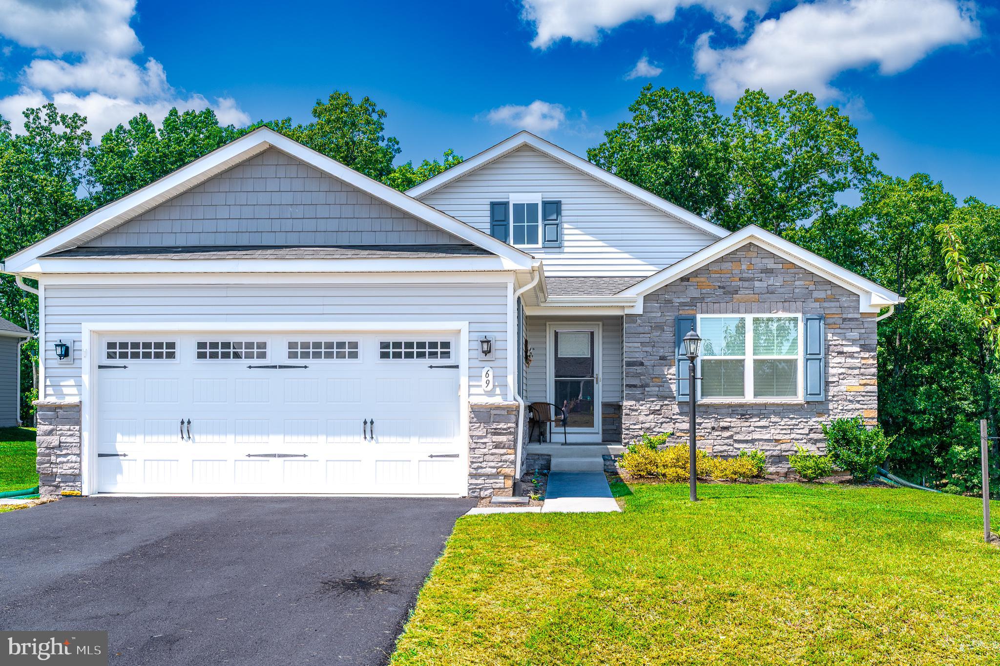 Skip the wait for a new build and step into this nearly new 2-year-old Dominica Spring model, which offers over 1,720 sq. ft. of stylish, open-concept living. You can enter through the foyer or the attached 2-car garage into a bright great room that seamlessly flows into the gourmet kitchen featuring a center island, dining area, and upgraded finishes.
The formal dining room, complete with French doors, is perfect for hosting gatherings, but it can also be easily converted into a home office or study. The primary bathroom includes an oversized walk-in closet, a tiled walk-in shower, and dual vanities. Two additional bedrooms and a full bath are conveniently located at the front of the home, ensuring comfort and privacy for family or guests.
You’ll enjoy outdoor living on the covered rear porch, which offers peaceful views of the community's treed open space. The full walkout basement includes a 3-piece rough-in, providing ample storage or the potential for additional finished living space. Just outside the sliding glass door, there is a finished block patio.
The subdivision features sidewalks, a tot lot, and a dog park. This home blends modern comfort with a sense of community and serene views, making it the perfect place to call home.
Conveniently located just minutes from I-81, shopping, and dining, this home offers both tranquility and easy access to amenities in one perfect package.