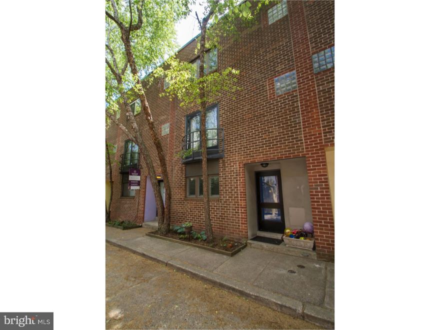 Nestled on a hidden, tree-lined block in beautiful Bella Vista, you'll find this fantastic and ever charming 3 bedroom, 2.5 bath home with finished basement, garden, 1-car parking and within the Meredith School catchment! Foyer entrance into the beautiful 2 year new kitchen with handsome Brazilian cherry cabinetry, granite countertop, glass tile backsplash, stainless steel appliances and bar counter. Wide open living and dining room area with beautiful wood floors, triple window with plantation shutters, crown moldings, wood burning fireplace and glass door to a private yard. On the second floor you'll find the master bedroom suite featuring a Juliet balcony overlooking the street, crown molding, walk in closet with built in shelving and racks and a sliding pocket door to the nicely renovated all tile bathroom with stall shower with stone tile floor and glass block window. The third level features two bedrooms with plenty of closet space and natural sunlight, plus a spacious full tile bath with tub off the hall. Finished basement makes a fantastic family room with powder room, Whirlpool laundry facilities, storage and mechanicals. New updates completed from 2012-2014 including the roof, HVAC, all windows, the kitchen, the finished basement and the master suite walk-in closet. 1-car parking off Bainbridge St in a gated lot- HOA fee of $50/month. This lovely home is located on a quiet street in the heart of an exciting area, convenient to restaurants, coffee shops, parks, the Italian Market, Center City, transportation and more!