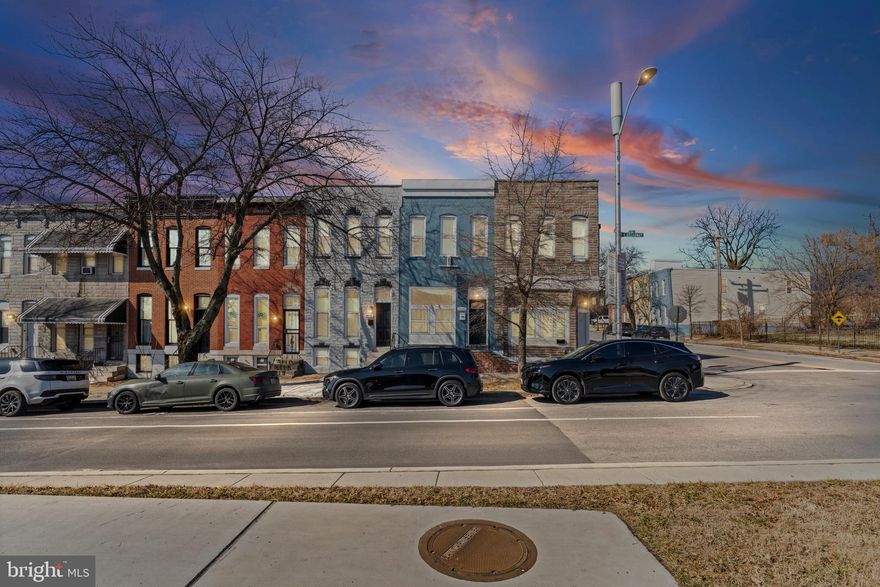 Newly refreshed and move-in ready 3BR/3.5BA Townhome located on the sunny side of the street in the quiet neighborhood of Oliver.  Make your way to the front door and step into a home filled with natural light, gleaming floors, recessed lighting, and crown molding and chair rail molding.  The main floor features an open concept floor plan offering a half bath, a large living room, a dining area, and a kitchen.  The kitchen boasts plenty of cabinets, stainless steel appliances, upgraded granite countertops, and breakfast seating with pendant lights.  The second floor contains two sizable secondary bedrooms, a full bath with a walk-in shower, and a primary suite with a private full bath. The lower level is finished offering additional living space, a full bath with a walk-in shower, a spacious family room, laundry and utilities. Step outside from the kitchen to a privately fenced yard with a large patio ideal for hosting family and friends.  This move-in-ready home is located in close proximity to John Hopkins Hospital, shopping, restaurants, and commuter routes. It would also qualify for the live near your work incentive program!